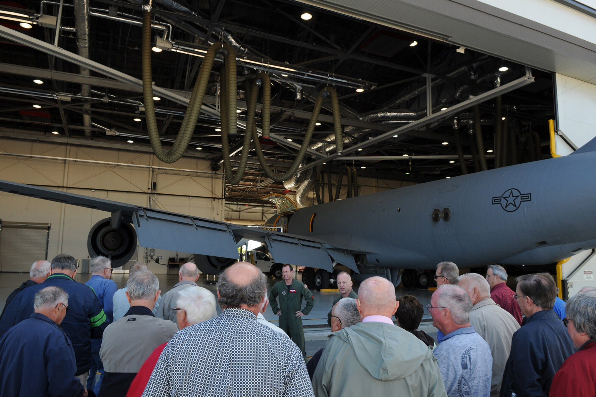 GRISSOM AIR RESERVE BASE, Ind. -- Members of the Britton Falls Veterans group receive a briefing by Chief Master Sgt. Jeff Maier in front of a KC-135 Stratotanker Sept. 7. The group toured Grissom to gain perspective on the operations of the base and the role it has not only in the military, but in the surrounding community. Maier is the 74th Air Refueling Squadron in-flight refueling superintendant (U.S. Air Force photo/Senior Airman Jami K. Lancette)