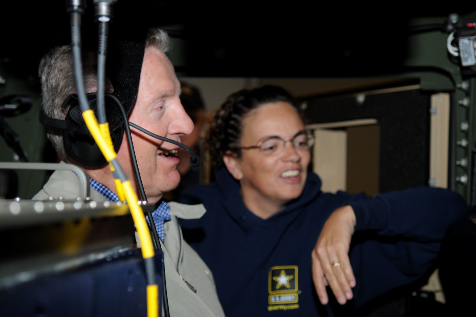 GRISSOM AIR RESERVE BASE, Ind. -- Greg Zolezzi, a member of the Britton Falls Veterans group, along with Julie Miller, U.S. Army reserve's 316th Psychological Operations unit administrator here, sits in the back seat of a Humvee at the 316th Tactical Psychological Operations Company here. The group toured Grissom to gain perspective on the operations of the base and the role it has not only in the military, but in the surrounding community. (U.S. Air Force photo/Senior Airman Jami K. Lancette)