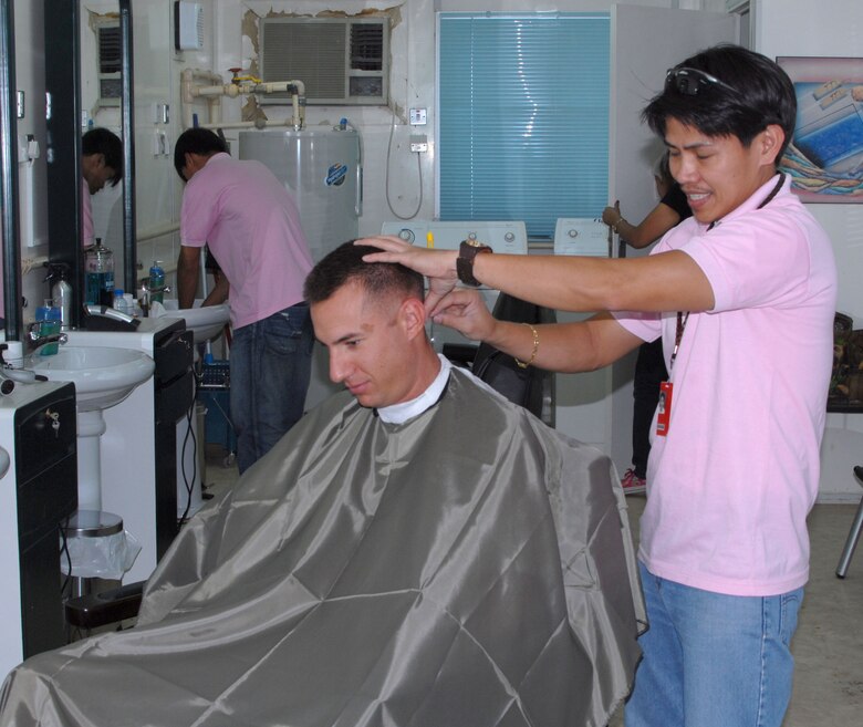 Airmen turn laundry room into a barber  shop U S Air 
