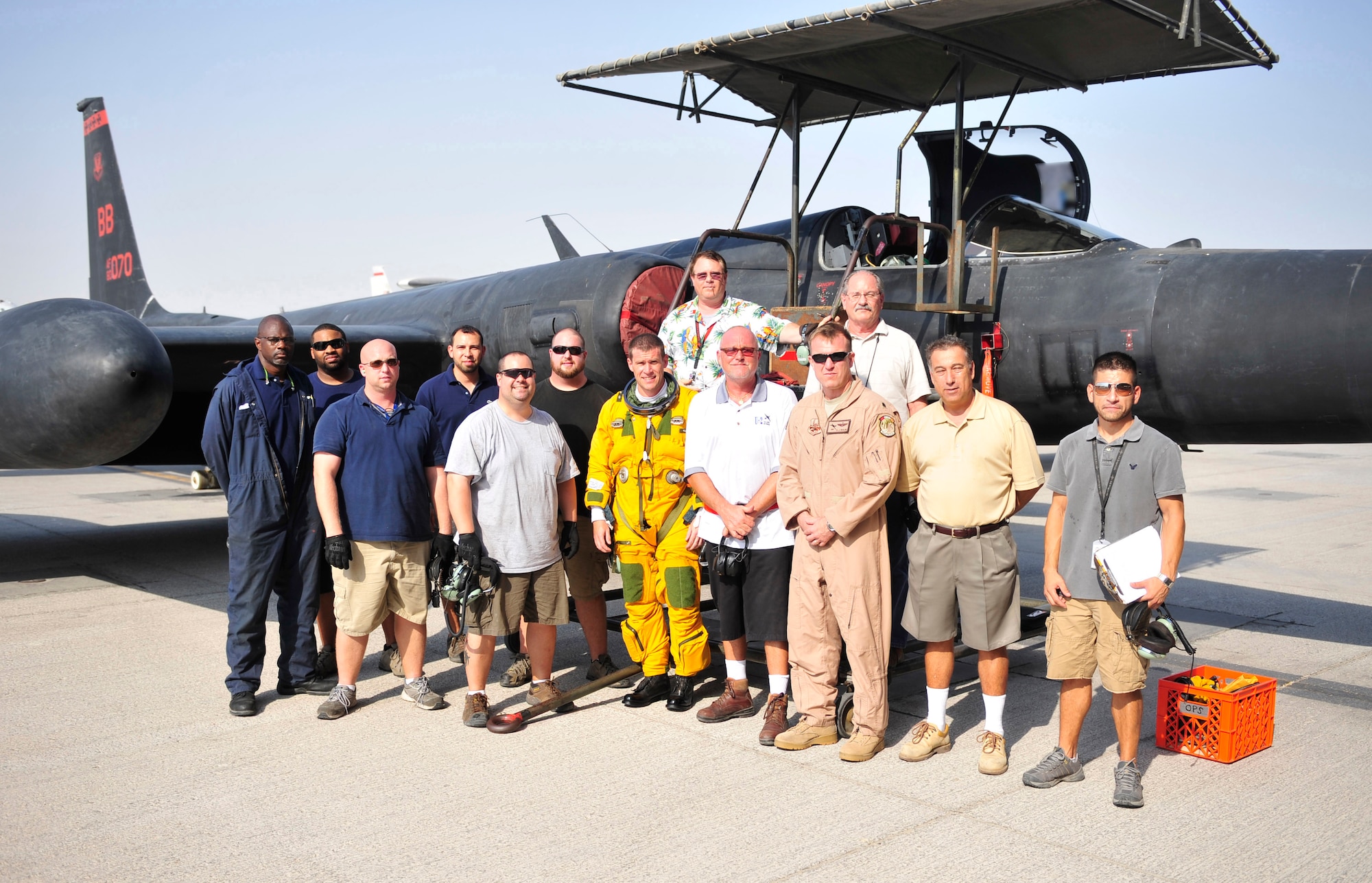 The U-2 phase team from Lockheed Martin Aeronautics poses for a final photo Sept. 16, 2011, after their final phase inspection at the 380th Air Expeditionary Wing in Southwest Asia. The team is made up of crew chiefs and hydraulic, fuels, avionics and electrical experts and has been providing inspections in the deployed location since 2004.  Inspections are moving to Beal Air Force Base, Calif. (U.S. Air Force photo/Tech. Sgt. Patrick Mitchell)