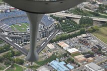 A KC-135R from the 916th Air Refueling Wing, Air Force Reserve, flies over the Bank of America Stadium in Charlotte as part of the Carolina Panthers home-opener against the Green Bay Packers. The aircrew and maintainers aboard were recognized on the field during the half-time show. (USAF photo by Master Sgt. Wendy Lopedote, 916ARW/PA)