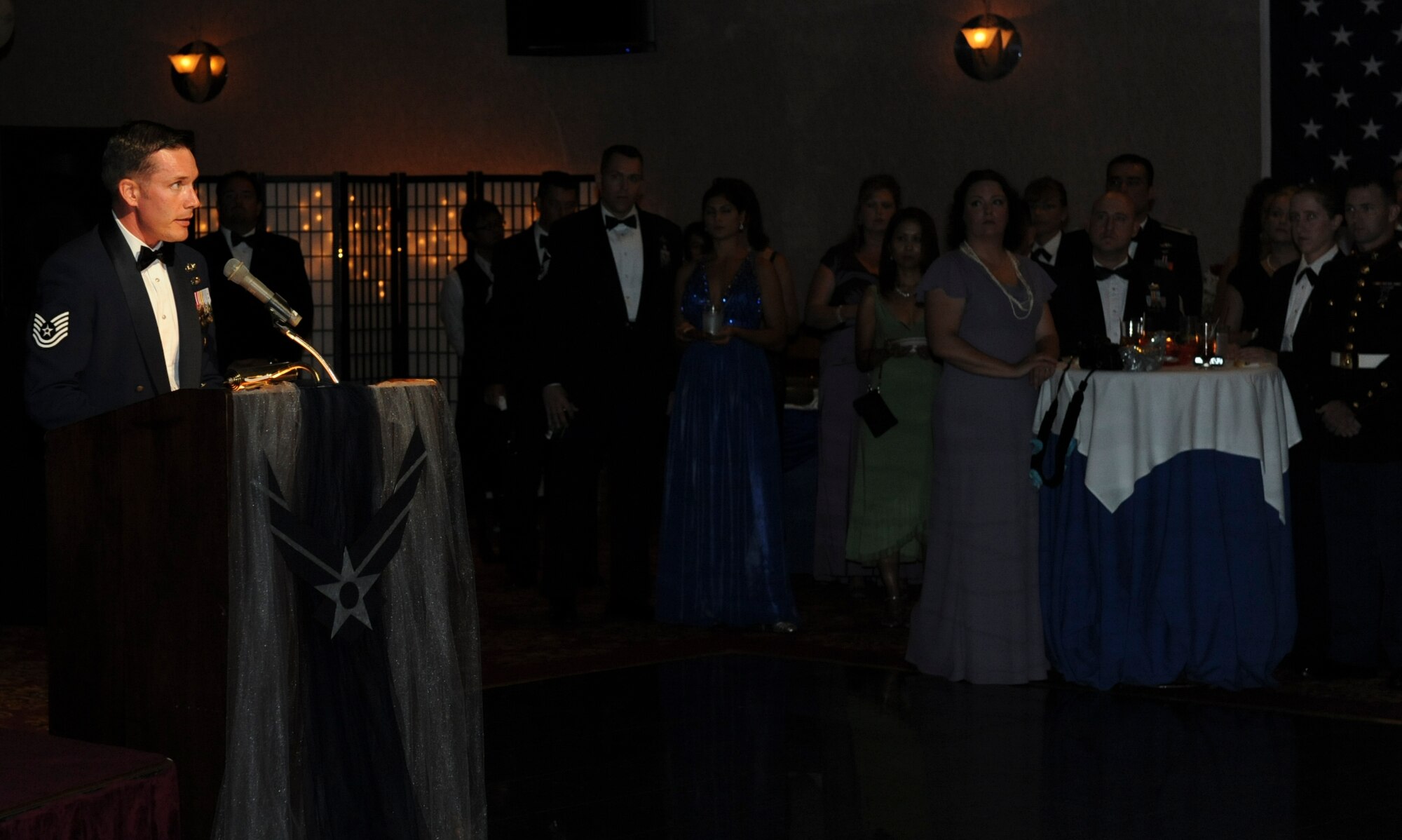 Tech. Sgt. Robert Mathews, Military Justice assistant NCOIC, announces the distinguished guests at Kadena's Rocker NCO Club during the Air Force Ball Sept. 17, 2011. The Air Force Ball was held in honor of the Air Force’s 64th birthday and is a night to celebrate our great heritage and those that came before us. (U.S. Air Force photo by Airman 1st Class Brooke P. Beers)