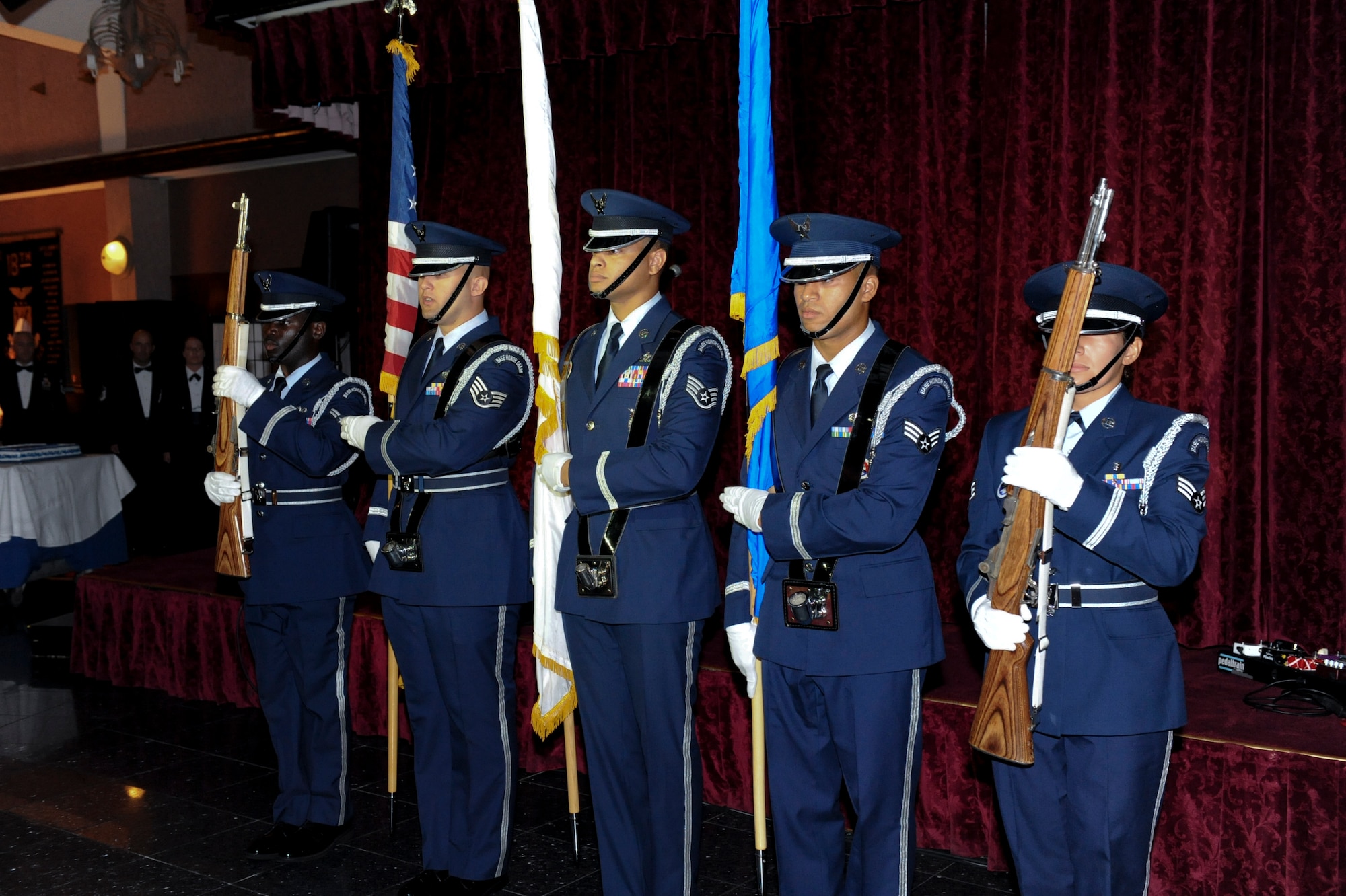 Airmen from the Kadena Honor Guard presents the colors during the Air Force Ball at the Rocker NCO Club Sept. 17, 2011. The Air Force Ball was held in celebration of the Air Force’s 64th birthday. (U.S. Air Force photo by Airman 1st Class Brooke P. Beers)