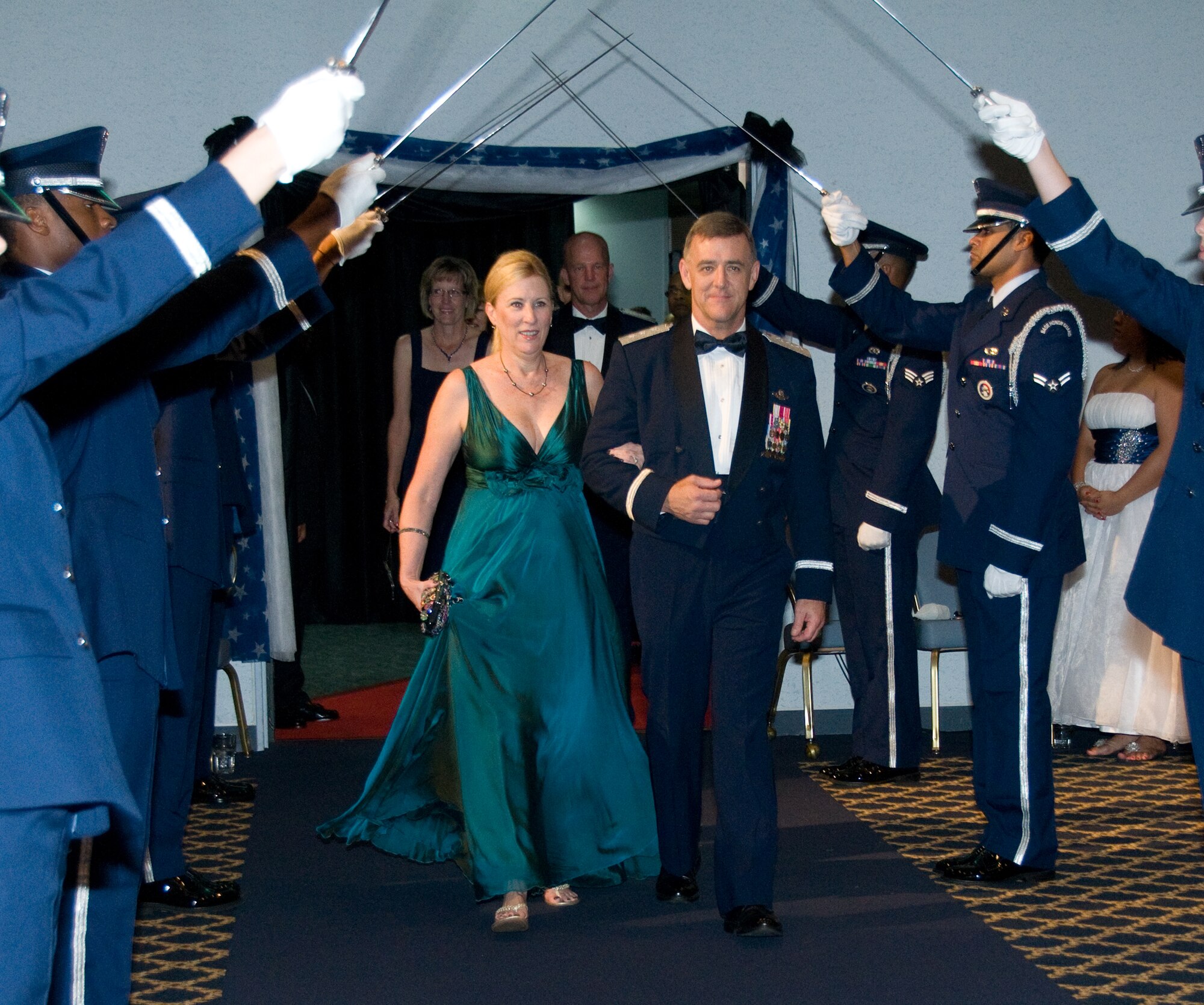 YOKOTA AIR BASE, Japan -- Lt. Gen. Burton Field, Commander of U.S. Forces Japan and 5th Air Force and his wife, Lisa Field, enter the Taiyo Community Center ballroom for the Air Force Ball at Yokota Air Base, Japan, Sept. 17, 2011. As guest speaker, General Field briefly spoke about the history of the 64- year old Air Force and its lasting impact on the world today.  (U.S. Air Force photo/Airman 1st Class Krystal M. Garrett) 