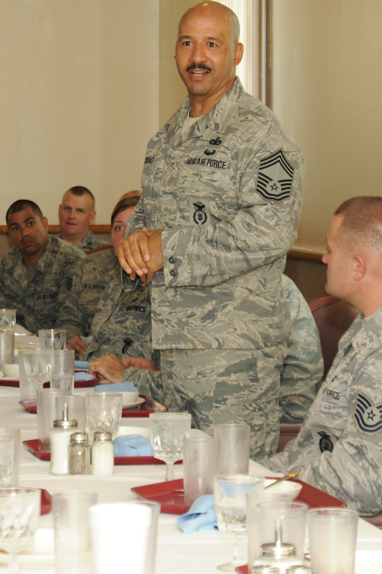 KUNSAN AIR BASE, Republic of Korea -- Chief Master Sgt. Paul Zidack, Security Forces Manager, Headquarters Air Force Security Forces Center, Lackland Air Force Base, Texas, speaks with NCOs from the 8th Security Forces Squadron here Sept. 13. Zidack is the senior enlisted member of this Air Force Field Operating Agency, with over 190 personnel assigned to four geographically separated areas. (U.S. Air Force photo/Senior Airman Brittany Y. Bateman)

