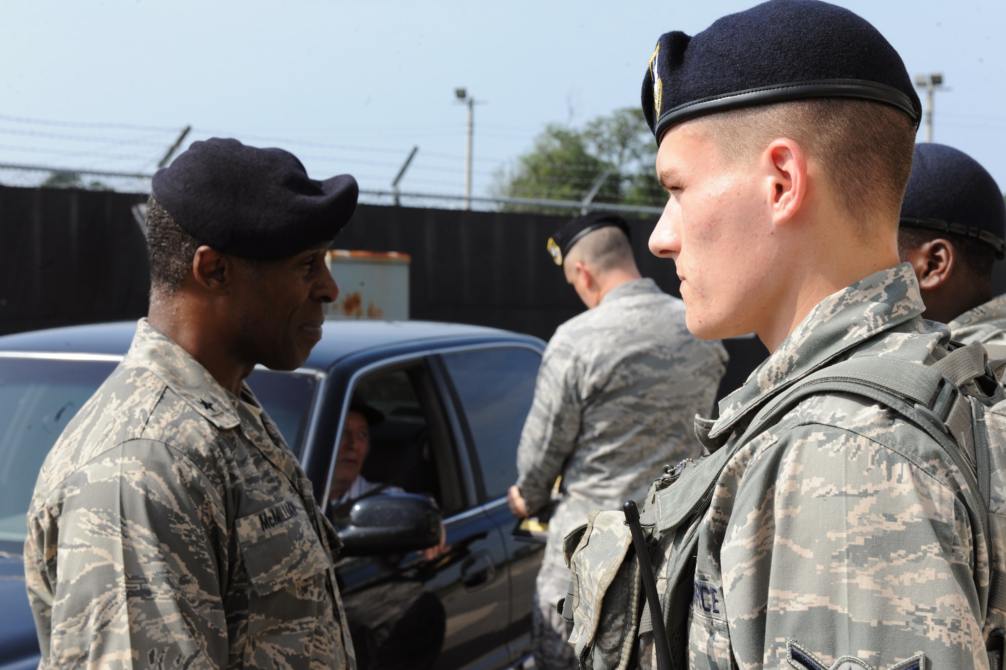 KUNSAN AIR BASE, Republic of Korea -- Brig. Gen. Jimmy McMillian, Director of Security Forces, Deputy Chief of Staff for Logistics, Installations and Mission Support, Headquarters U.S. Air Force, Washington, D.C., visits with members of the 8th Security Forces Squadron at their guard posts here Sept. 13. McMillian provides policy and oversight for protecting Air Force resources from terrorism, criminal acts, sabotage and acts of war and he ensures security forces members are trained, equipped and ready to support contingency and exercise plans. (U.S. Air Force photo/Senior Airman Brittany Y. Bateman)

