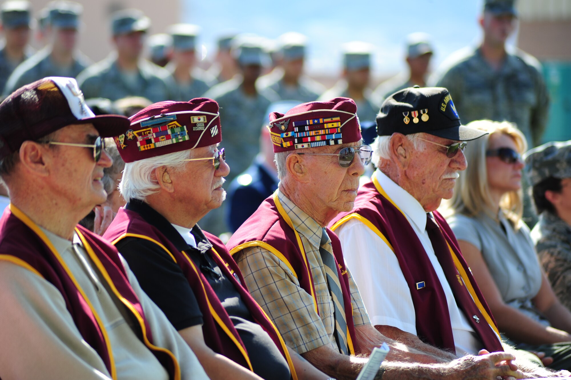 From left, Carroll Knutson, Gene Ramos, Jack Leaming and Dean Whitaker, former prisoners of war, participate in the National Prisoner of War/Missing in Action Recognition Day ceremony Sept. 16, 2011, at Nellis Air Force Base, Nev. The National POW/MIA Recognition Day is observed across the nation on the third Friday of September each year. On this day, many Americans take time to remember those who were prisoners of war and those who are missing in action, as well as their families. (U.S. Air Force photo by Staff Sgt. William P. Coleman/Released)
