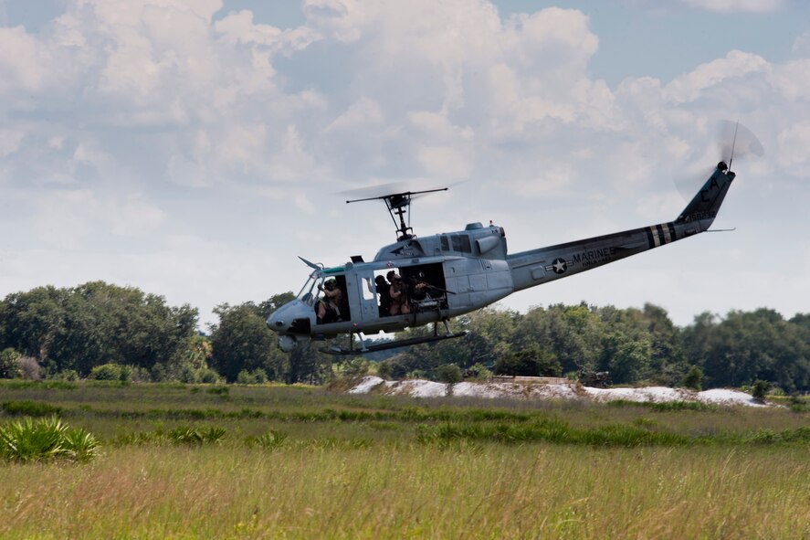 A U.S. Marine Corps UH-1N Huey from Marine Light Attack Helicopter Squadron 467 takes off during a training mission during exercise Atlantic Strike 11-02 at Avon Park Air Force Range, Fla., Sept. 14, 2011. Atlantic Strike is a joint exercise focusing on close air support functions where joint terminal attack controllers direct air strikes on moving and stationary ground targets. (U.S. Air Force photo by Staff Sgt. Jamal D. Sutter/Released
