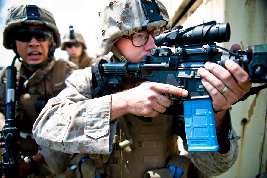 U.S. Marine Corps Pfc. Aaron Bowen, 2nd Tank Battalion (2nd Tanks) antitank missileman, aims his weapon during exercise Atlantic Strike 11-02 at Avon Park Air Force Range, Fla., Sept. 13, 2011. The 2nd Tanks is an armored battalion out of Marine Corps Base Camp Lejeune, N.C., and performed ground forces mission during the exercise. Atlantic Strike is a joint exercise which focuses on close air support functions where ground controllers direct air strikes on moving and stationary ground targets. (U.S. Air Force photo by Staff Sgt. Jamal D. Sutter/Released)
