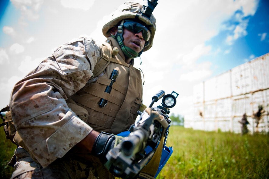 U.S. Marine Corps Pfc. Lawrence Davis, 2nd Tank Battalion antitank missileman, darts for better positioning during exercise Atlantic Strike 11-02 at Avon Park Air Force Range, Fla., Sept. 13, 2011. During a training scenario, members of Davis’ team were attacked by opposing forces, causing a need to secure the area and take out any threats. (U.S. Air Force photo by Staff Sgt. Jamal D. Sutter/Released)