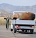 Tech. Sgt. Ronald Dunn, 729th Airlift Squadron loadmaster, guides a Mongolian driver who is backing the truck toward an Air Force Reserve C-17 Globemaster III in Mongolia, Aug. 26.  Dunn was part of a crew from March Air Reserve Base, Calif., who were assigned to a mission to retrieve space debris that fell to earth last summer.  The parts were identified as expended rocket parts from an Air Force missile launched into space nearly a decade ago.  (U.S. Air Force photo/Master Sgt. Linda Welz)