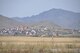 During a space debris retrieval mission in August, 2011, veteran airlift crew members from March Air Reserve Base, Calif., said Mongolia seemed much unchanged since the military's first flight into the country in 1991.  Here a village sits on a hill overlooking the Chinngis Khaan International Airport in Mongolia, Aug. 26, 2011. (U.S. Air Force photo/Master Sgt. Linda Welz)

A Mongolian village sits on a hill overlooking the airport where the March C-17 picked up the rocket debris.