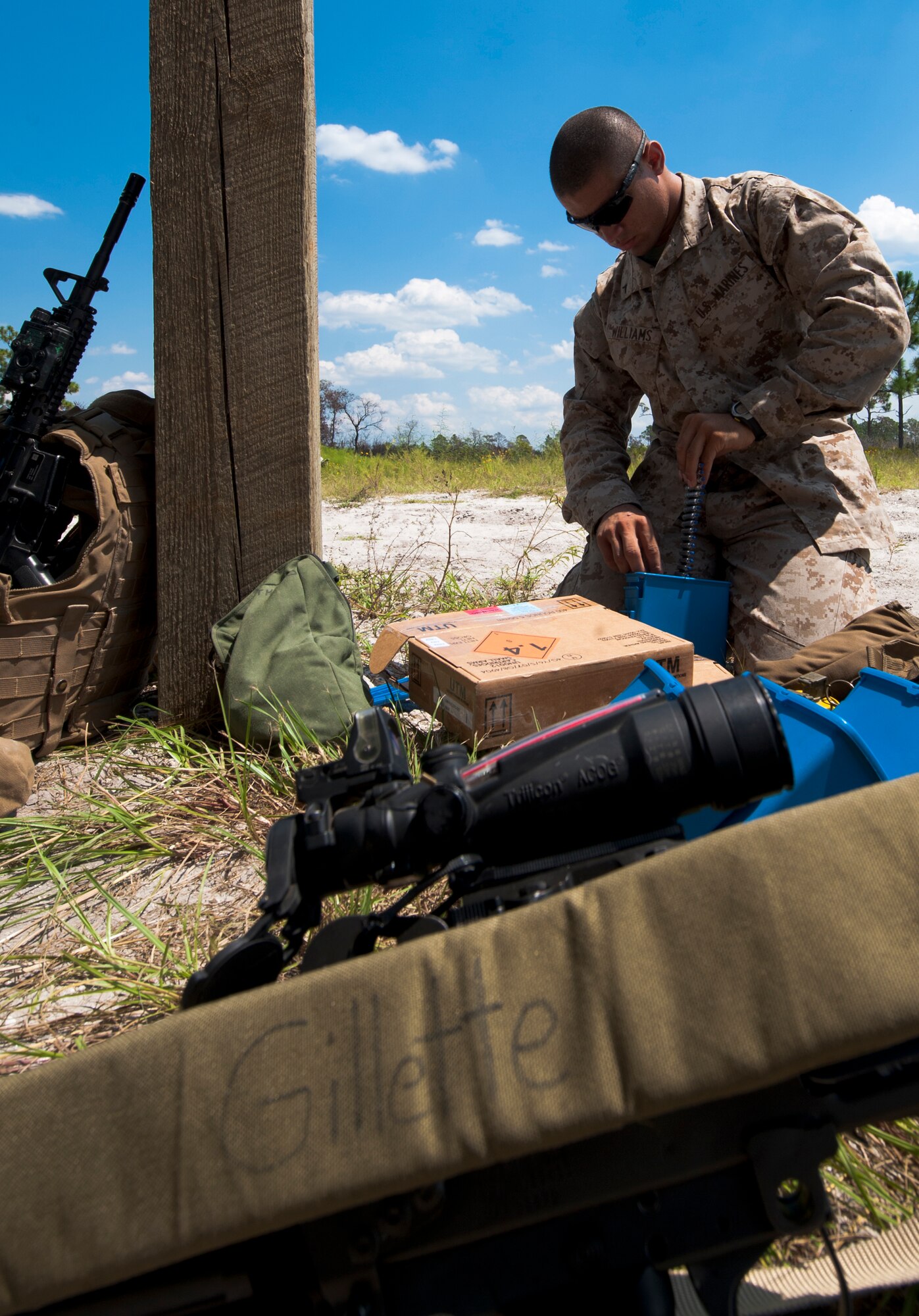 U.S. Marine Corps Pfc. Joshua Williams, 2nd Tank Battalion anti-tank missileman loads non-lethal marking rounds into a box magazine Sept. 13, at Avon Park Air Force Training Range. The non-lethal rounds added another level of reality for the Service members who participated in Exercise Atlantic Strike. (U.S. Air Force photo by Airman 1st Class Jarrod Grammel/Released) 
