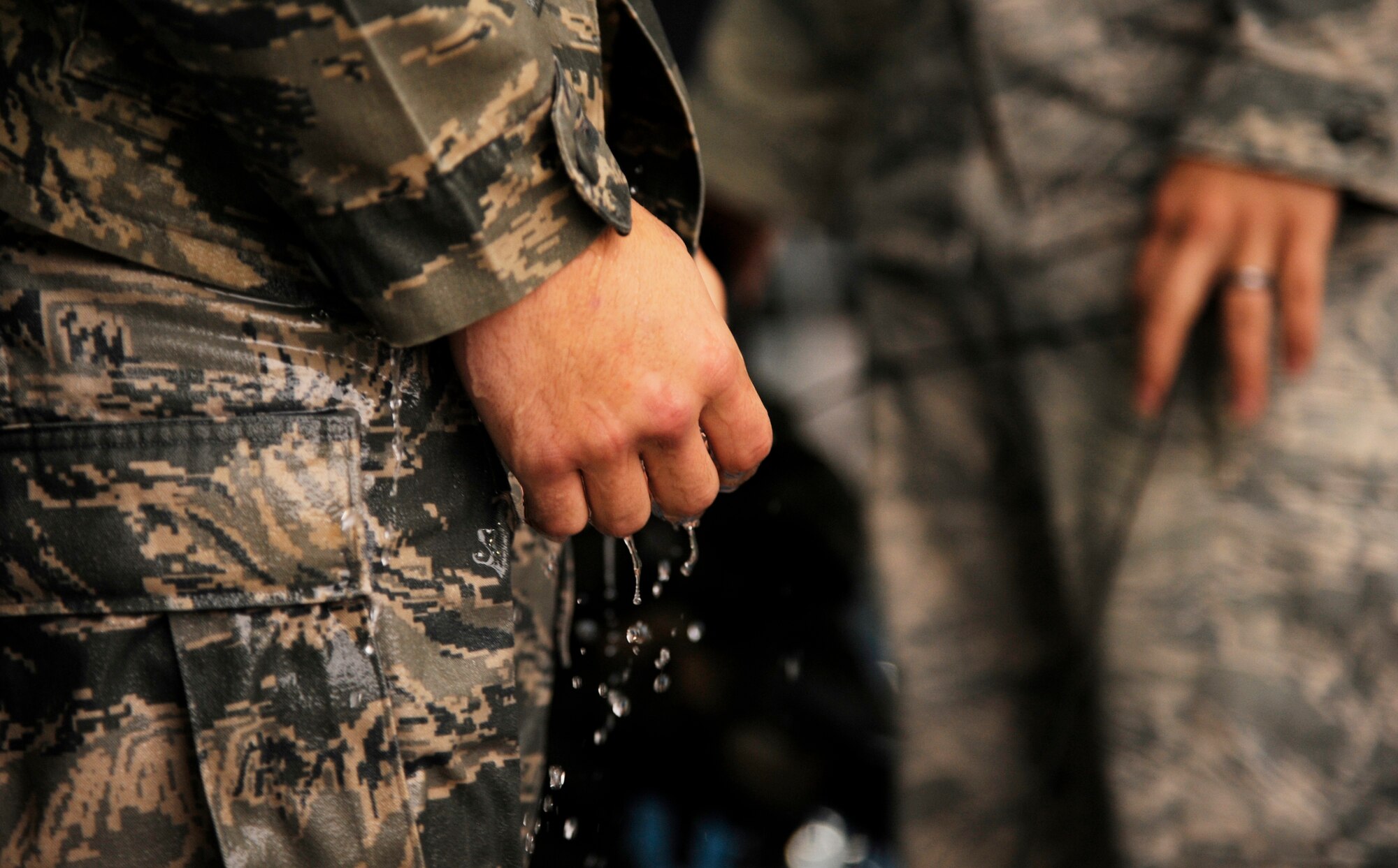 WARRENSBURG, Mo. - Airman 1st Class Andrew Timler, 509th Security Forces Squadron memeber, gets out of the pool while conducting water-survival training at the Warrensburg Recreation Center Sept. 15. These Airmen are brushing up on skills needed to get a recommendation to the Air Force Pre-Ranger Course. The Airman that shows the most leadership abilities and highest physical and mental endurance throughout training will be sent. (U.S. Air Force photo by Senior Airman Cody H. Ramirez)