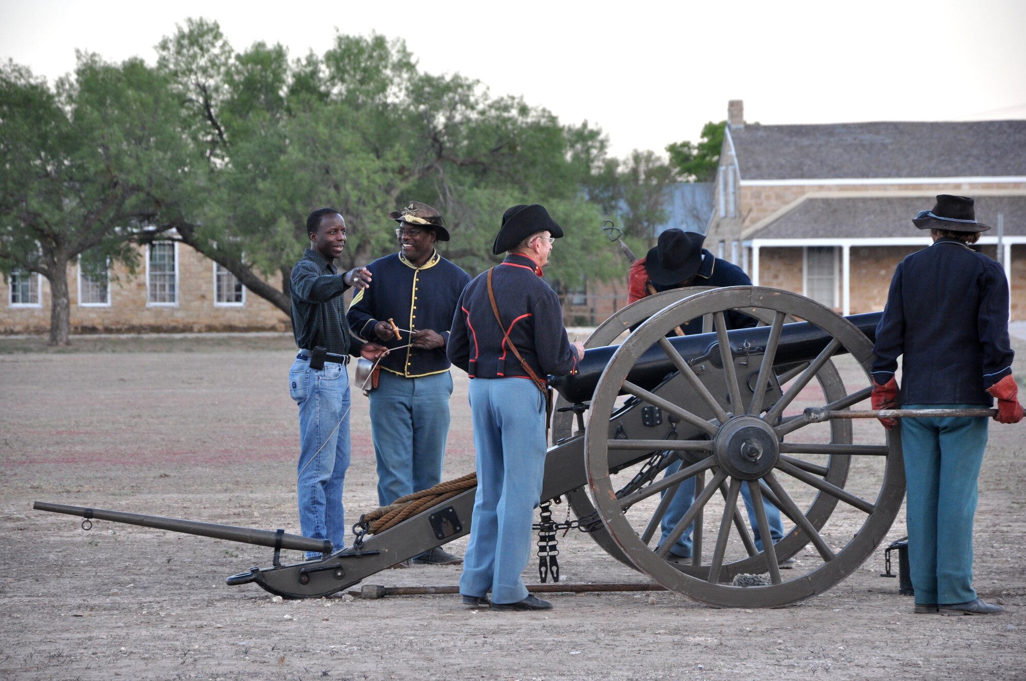 SAN ANGELO, Texas -- Gen. Edward Rice, Commander of Air Education and Training Command, talks to Buffalo Soldier and Infantrymen re-enactors at historic Fort Concho during his visit to Goodfellow Air Force Base Sept. 14-15. (U.S. Air Force photo/Kent Cummins)