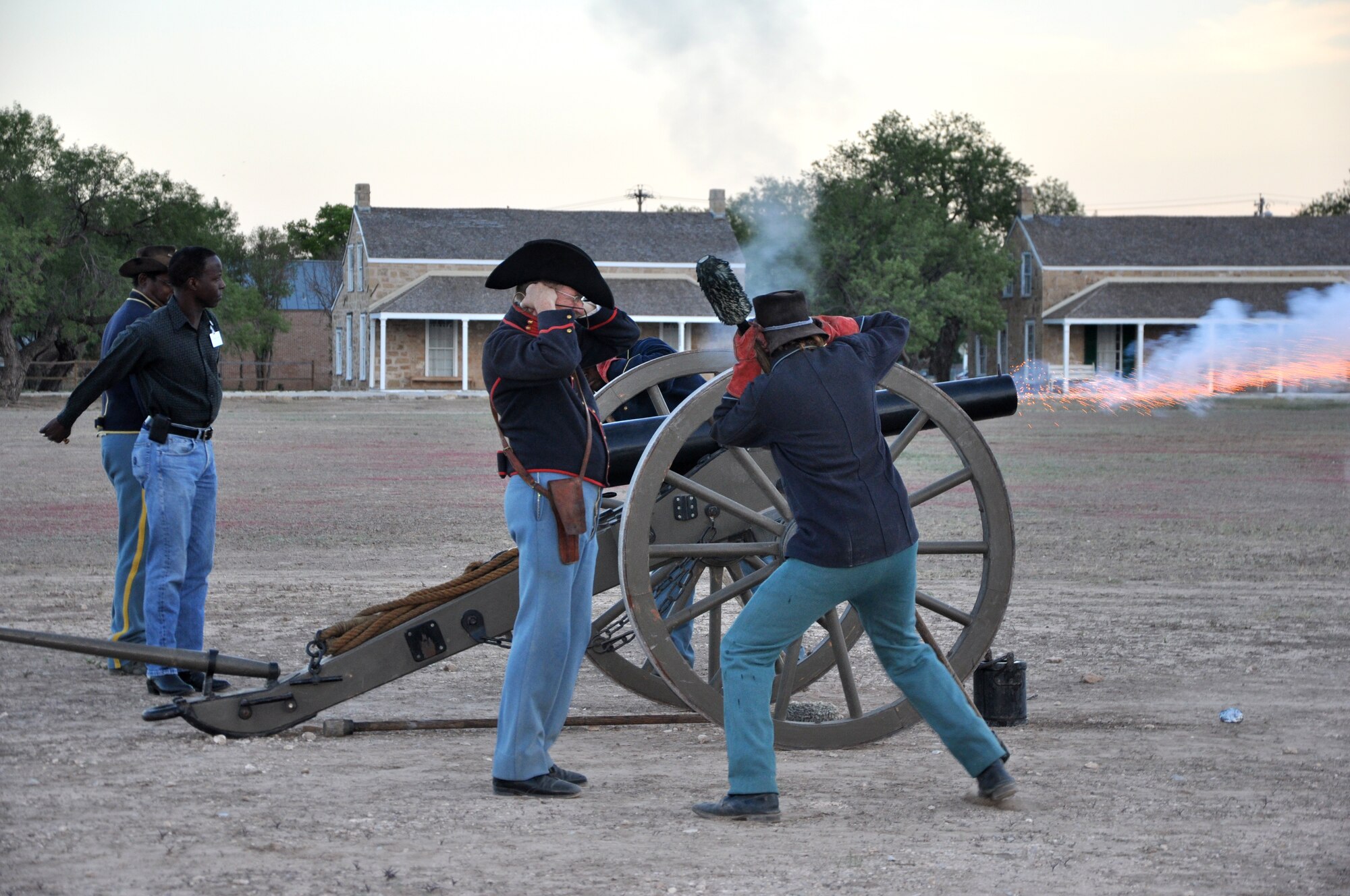 SAN ANGELO, Texas -- Gen. Edward Rice, Commander of Air Education and Training Command, fires a cannon at the Fort Concho National Historic Landmark during a civic leader event Sept. 14.  The general met with members of the community during his visit to Goodfellow Air Force Base. (U.S. Air Force photo/Kent Cummins)