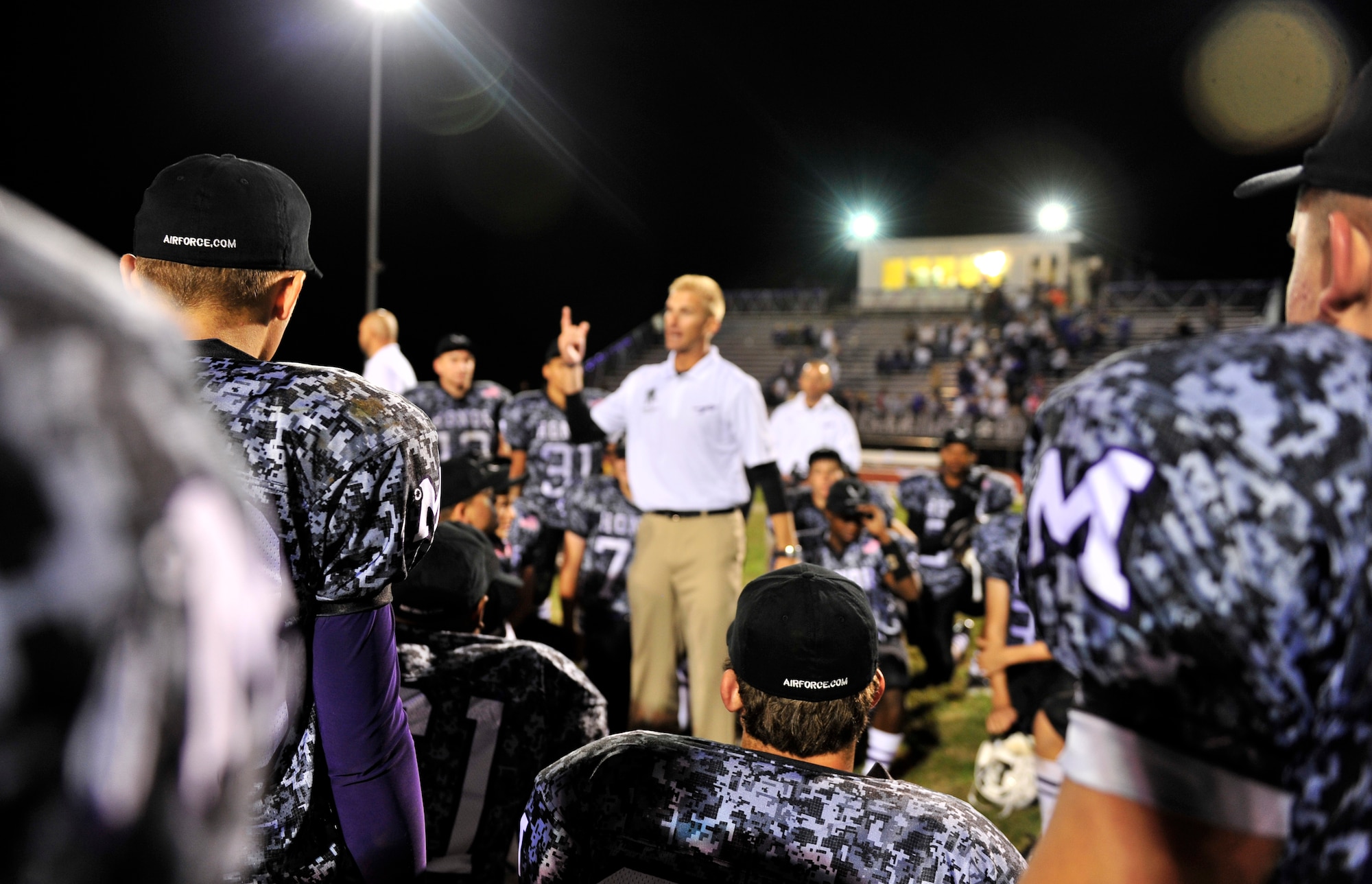 Mascoutah High School Head Coach Scott Battas, underscores the game after beating their rival Highland Bulldogs, during the inaugural Armed Forces Football Classic game Sept. 16, 2011 at Mascoutah High School Stadium.  Mascoutah beat Highland 34 - 18, and earned their first win against Highland in 5 years. (U.S. Air Force photo/ Staff Sgt. Stephenie Wade)