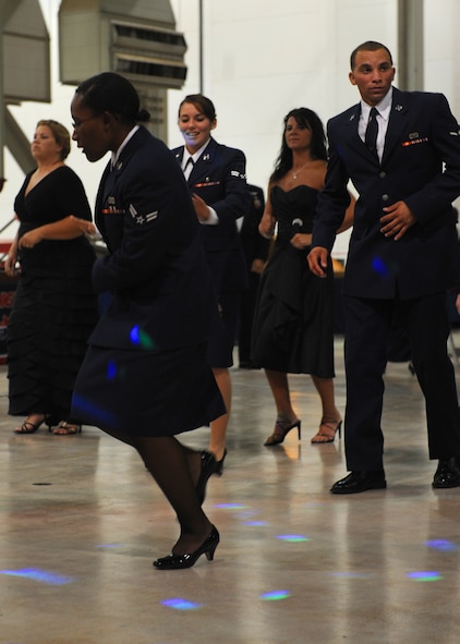 Airmen dance during the Air Force Ball Sept. 17, 2011 celebrating the 64th anniversary of the Air Force at Dyess Air Force Base, Texas. The Air Force was established on Sept. 18, 1947 when President Harry Truman signed the National Security Act of 1947. (U.S. Air Force photo by Airman 1st Class Jonathan Stefanko/ Released)