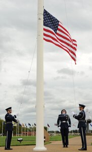 Base Honor Guard members lower the flag during a special retreat ceremony at Langley Air Force Base, Va., Sept. 16, 2011. The ceremony was performed to honor the 64th birthday of the Air Force. (U.S. Air Force photo by Airman 1st Class Teresa Cleveland)