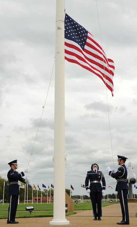 Base Honor Guard members lower the flag during a special retreat ceremony at Langley Air Force Base, Va., Sept. 16, 2011. The ceremony was performed to honor the 64th birthday of the Air Force. (U.S. Air Force photo by Airman 1st Class Teresa Cleveland)