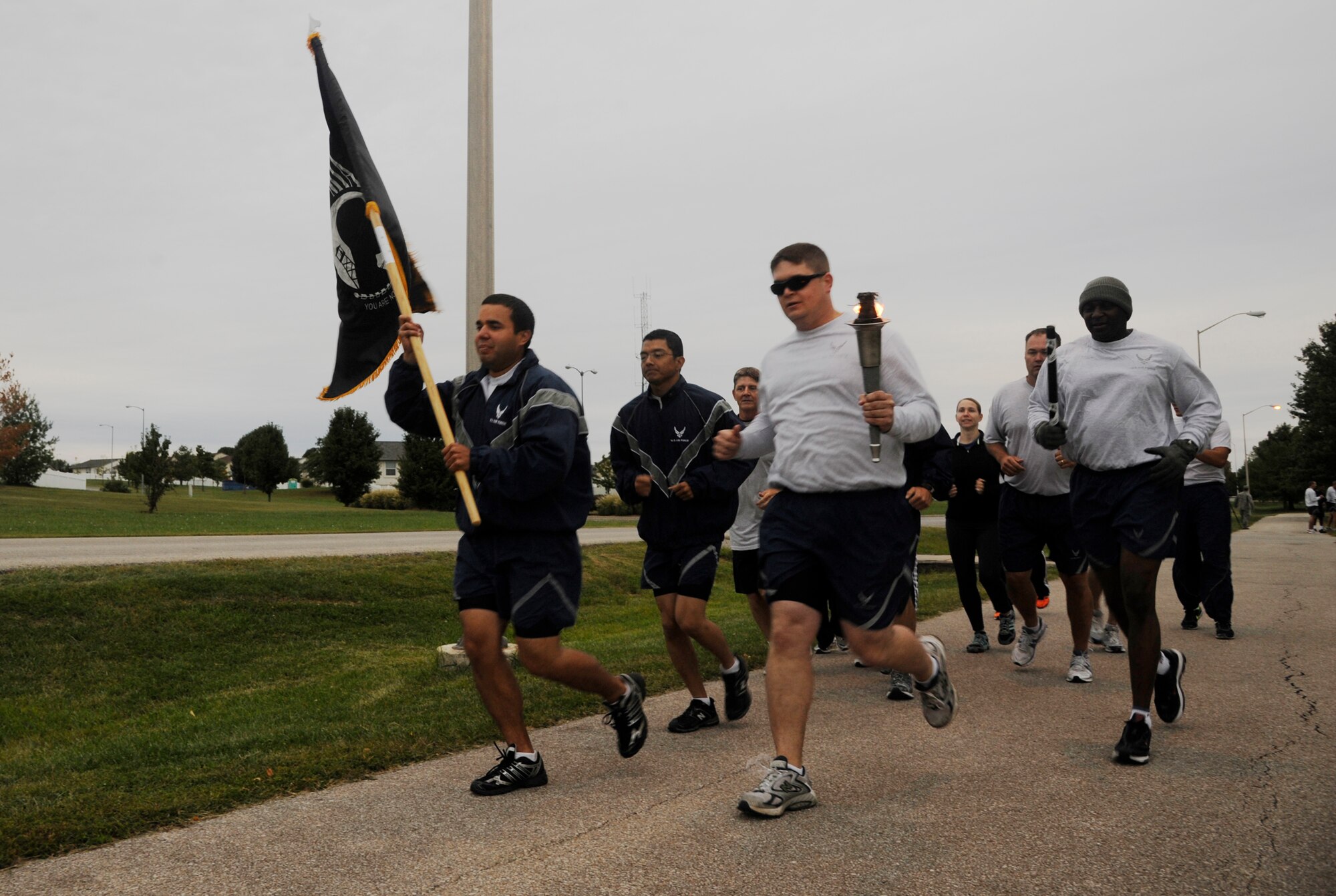 WHITEMAN AIR FORCE BASE, Mo. - Airmen support the POW/MIA run here Sept. 15. More than 400 people participated in the run to show their respect. (U.S. Air Force photo by Senior Airman Cody H. Ramirez)
