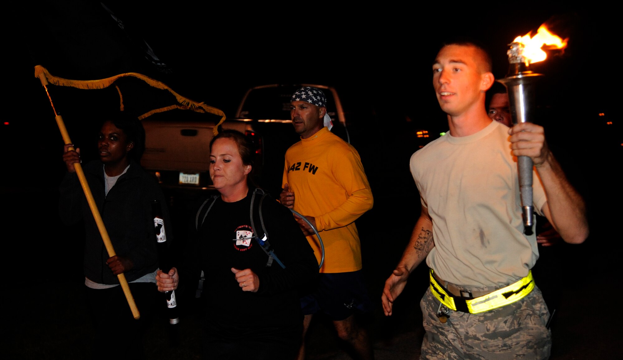 WHITEMAN AIR FORCE BASE, Mo. - Members of the 442nd Fighter Wing run during the POW/MIA run here Sept. 15.  Units from the 442nd FW (reserve unit on base), 131st Bomb Wing (Air National Guard unit on base) and the 1-135th Attack Reconnaissance Battalion (National Guard unit on base) came out to show their respects alongside the 509th Bomb Wing. (U.S. Air Force photo by Senior Airman Cody H. Ramirez)

