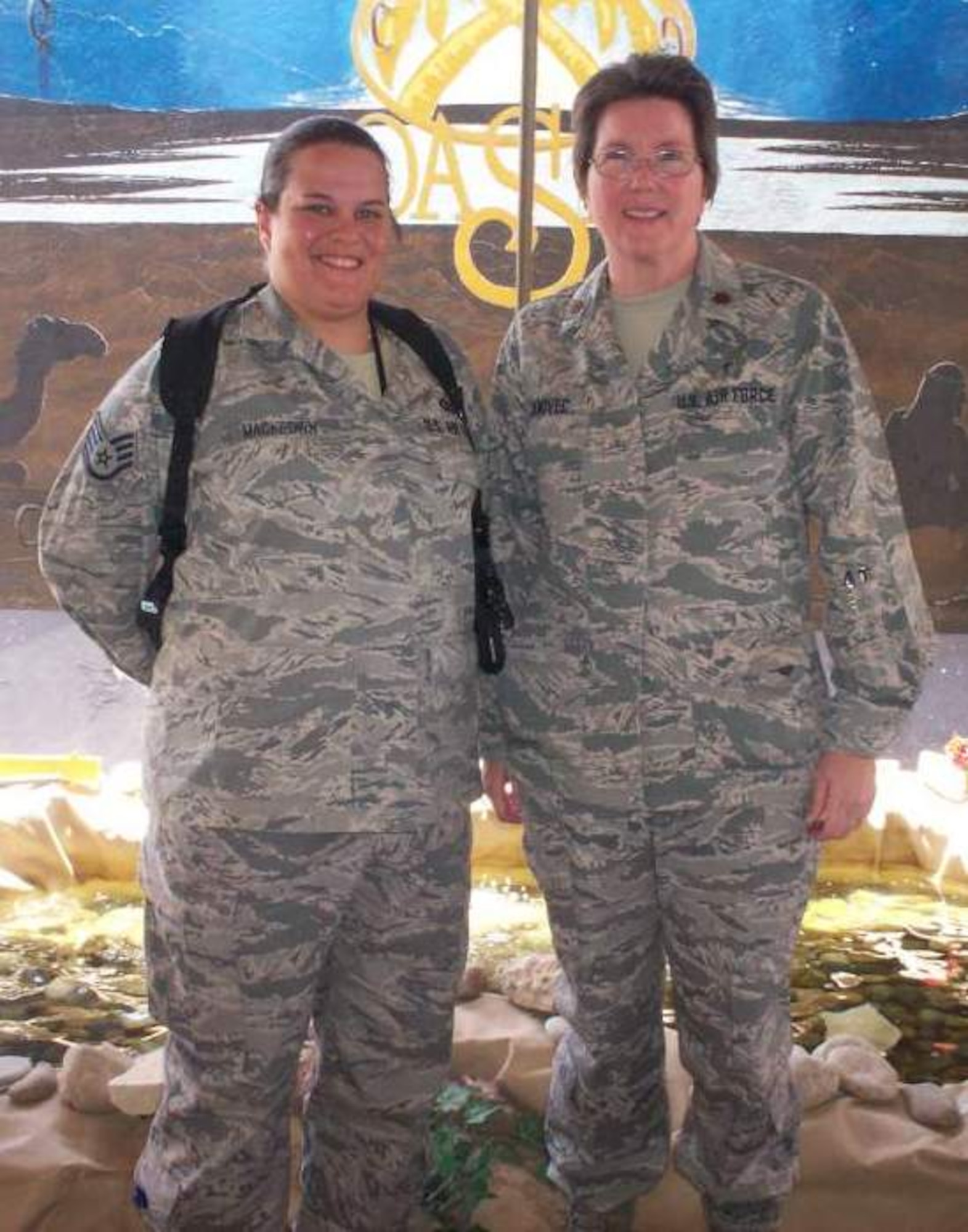 Staff Sgt. Kristine MacKeown (left), poses with Chaplain (Maj.) Leslie Janovec at Sather Air Base, Iraq. MacKeown is deployed from the 633rd Air Base Wing Chapel to the 321st Air Expeditionary Wing Chapel at Sather, where she serves as the NCOIC of Chapel Operations. (Courtesy photo)