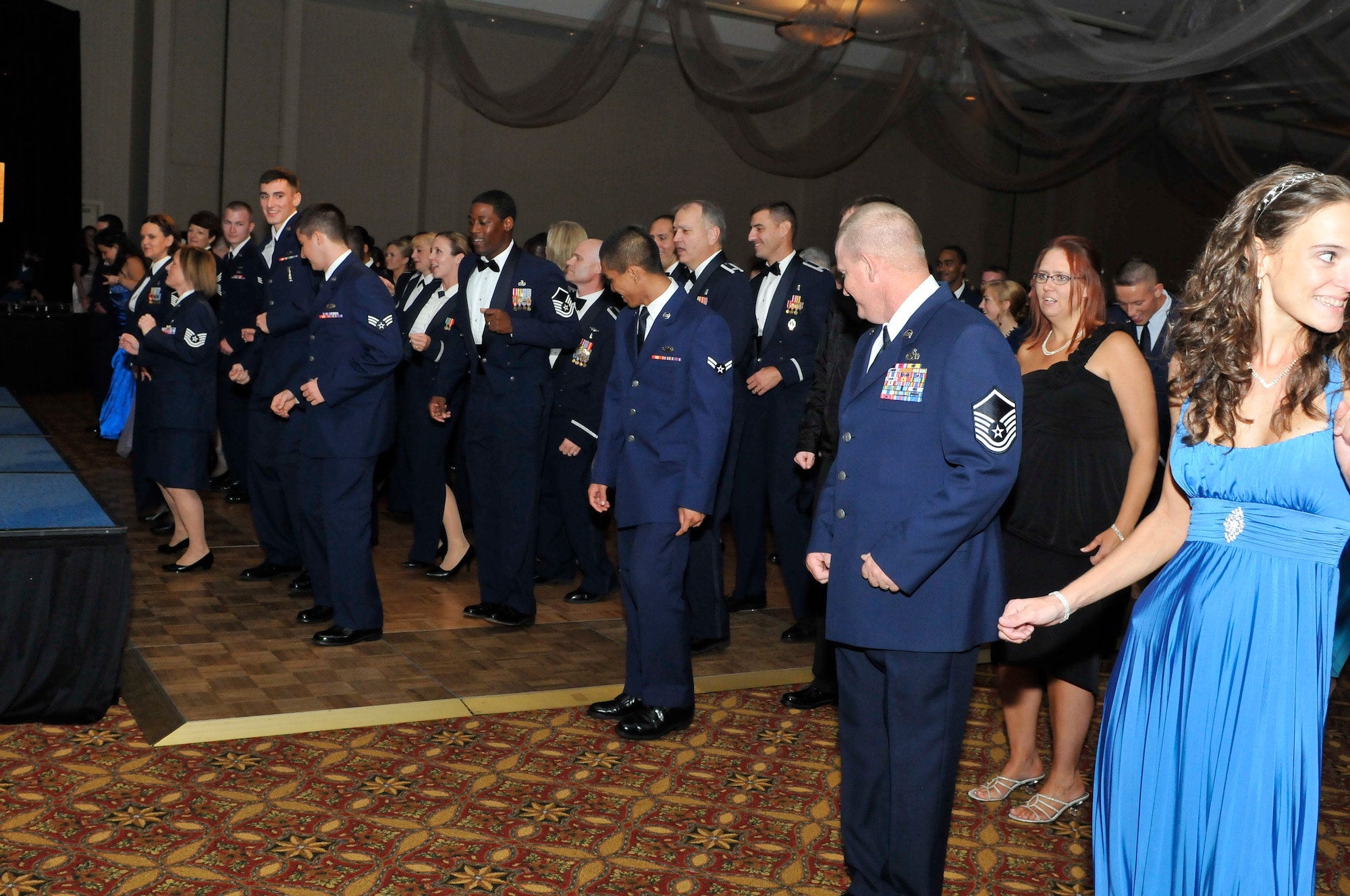 Team Tyndall members celebrate 64 years of Air Force history at the Air Force Ball 2011 Sept. 17. (U.S. Air Force photo by Lisa Norman)