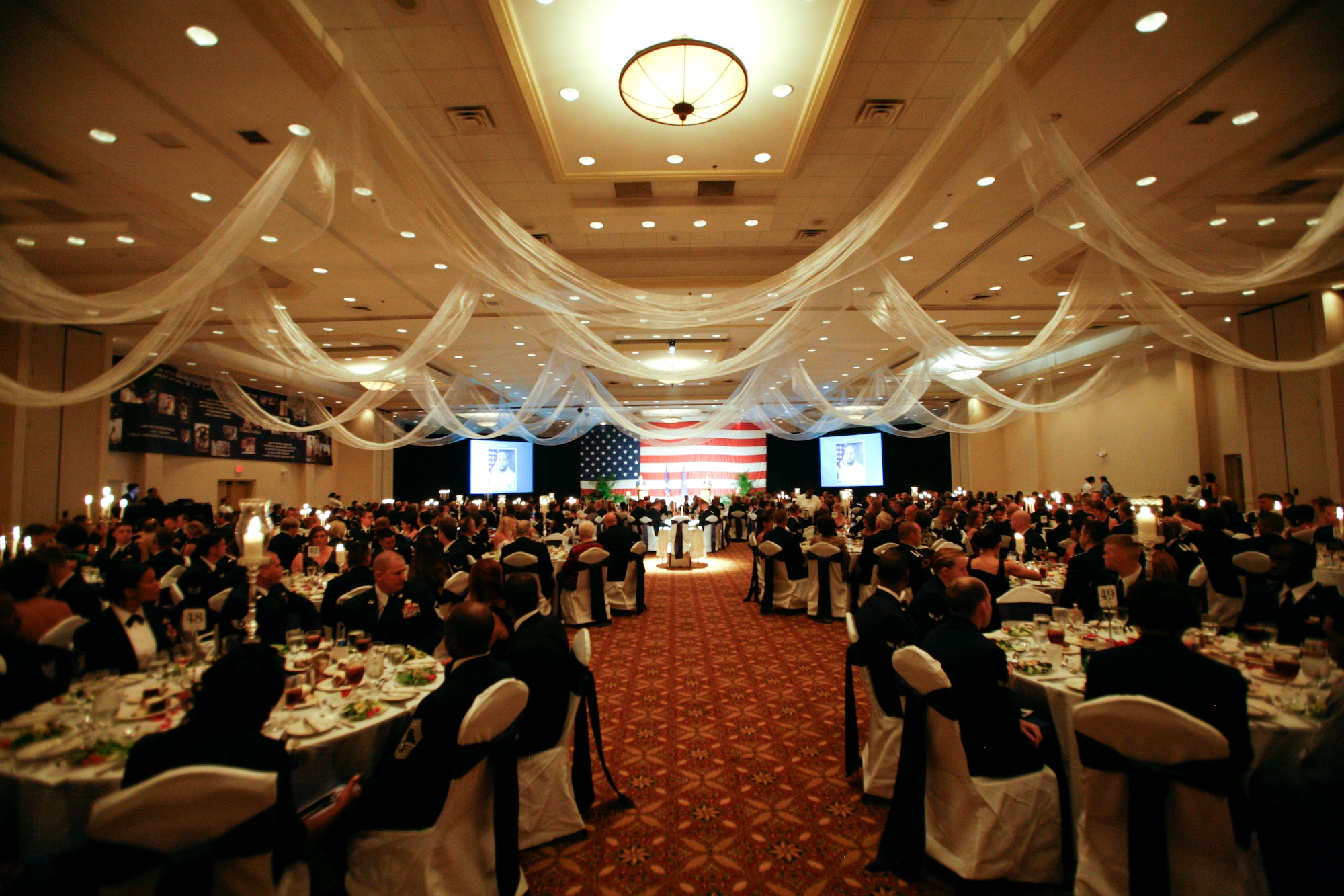 Team Tyndall members enjoy dinner during the Air Force Ball 2011, celebrating 64 years of U.S. Air Force history Sept. 17. (U.S. Air Force photo by Chris Cokeing) 