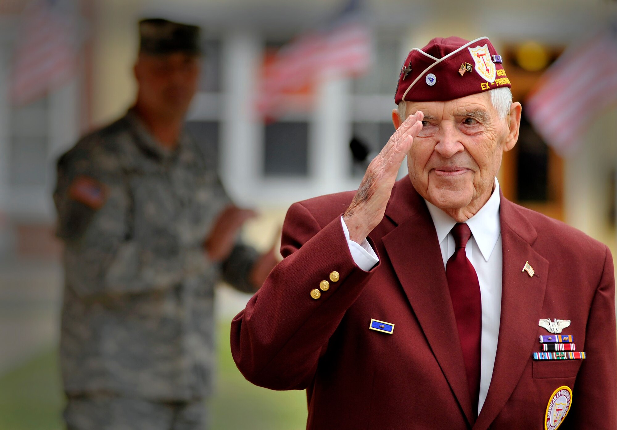 Louis Blanding Fowler, former prisoner of war and World War II veteran, salutes U.S. Air Force Airmen and U.S. Army Soldiers after speaking at during a ceremony recognizing national prisoners-of-war and missing-in-action day, Sept. 16, 2011 Sumter, S.C. Fowler spoke about his service in World War II and was presented a POW/MIA flag. (U.S. Air Force photo by Senior Airman Kenny Holston/Released)


