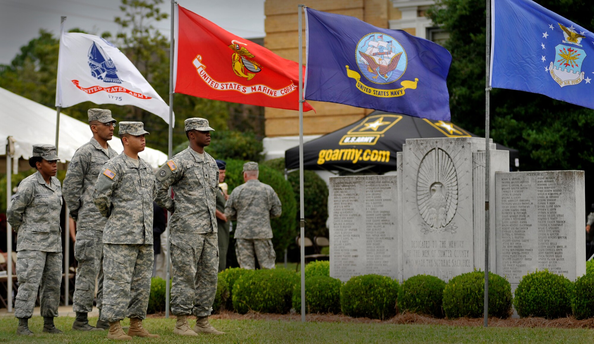 U.S. Air Force Airmen and U.S. Army Soldiers stand in formation as they prepare to lower the U.S. flag during a ceremony recognizing national prisoners-of-war and missing-in-action day, Sept. 16, 2011 Sumter, S.C. During the ceremony Louis Blanding Fowler, former prisoner of war, spoke about his service in World War II and was presented a POW/MIA flag. (U.S. Air Force photo by Senior Airman Kenny Holston/Released)


