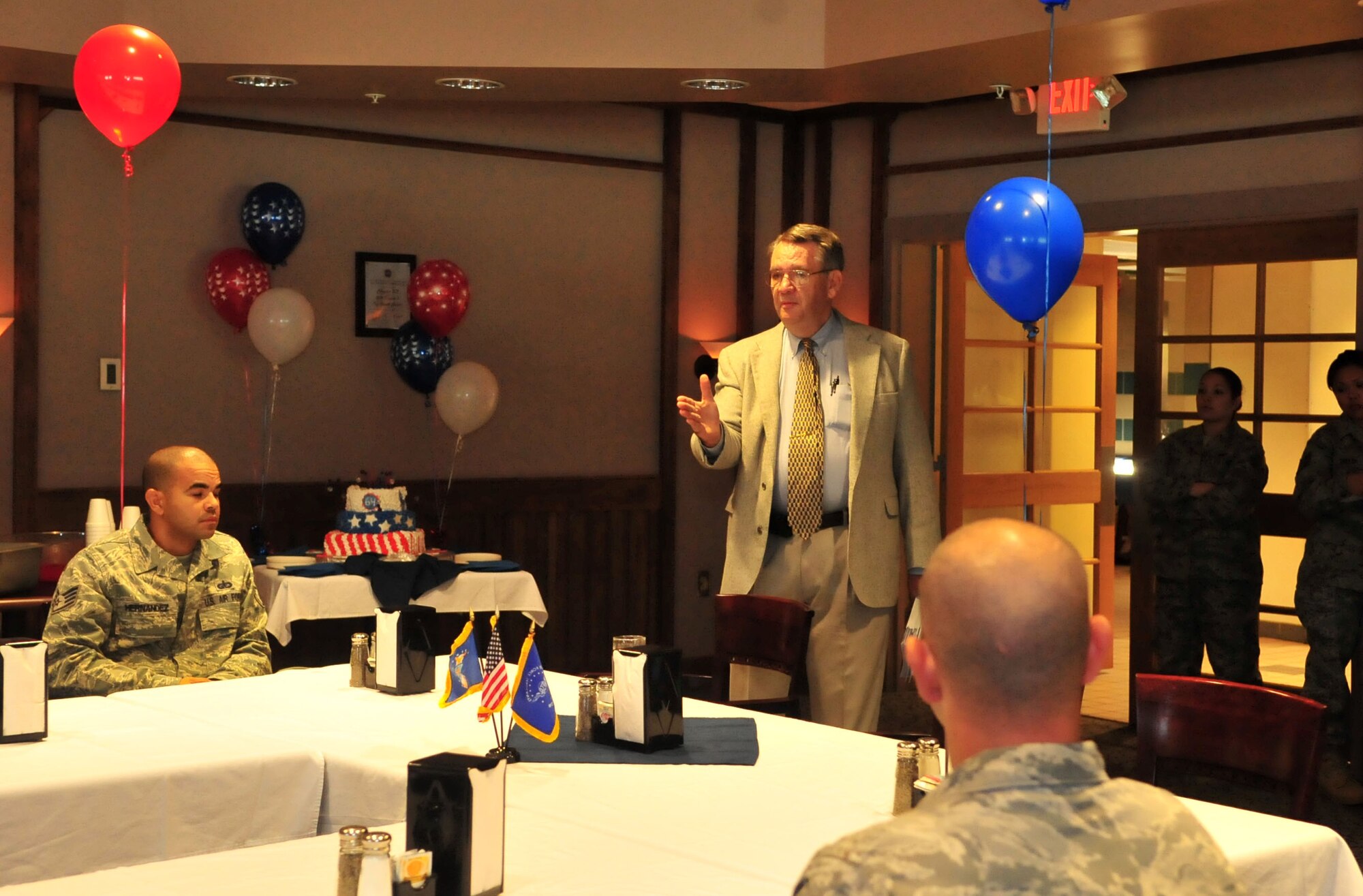 Dr. Roy Heidicker, 4th Fighter Wing historian, gives a speech on Air Force heritage during a celebration of the Air Force’s 64th birthday at the Southern Eagle Dining Facility at Seymour Johnson Air Force Base, N.C., Sept. 16, 2011. The event was hosted by the 4th Force Support Squadron and also included a video presentation, cake-cutting and trivia game where attendees won gift certificates. Currently, the Air Force is at its smallest active-duty force in its 64-year history, with 69 percent of the force directly supporting combat operations around the world. (U.S. Air Force photo by Senior Airman Marissa Tucker)