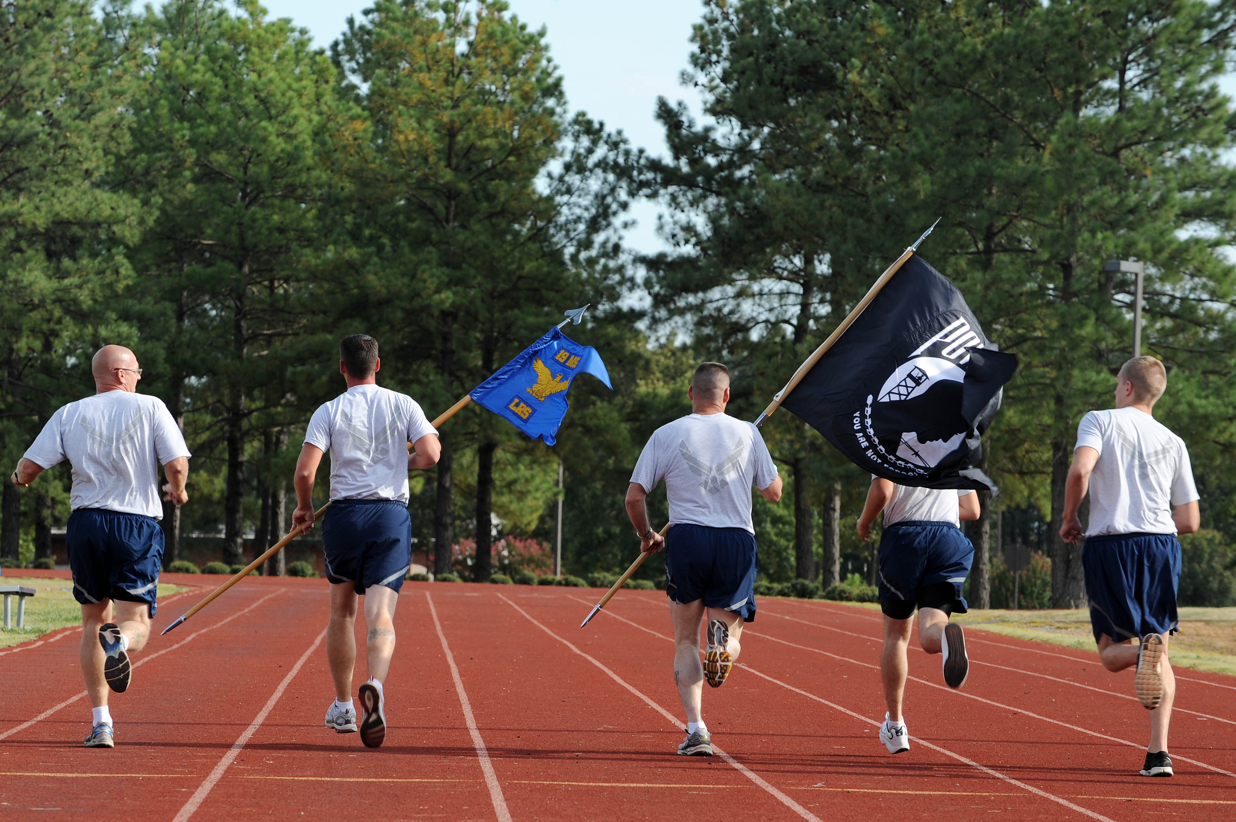 Airmen from the 19th Logistics Readiness Squadron kick off the National Prisoner of War/Missing in Action Remembrance run Sept. 16, 2011, at Little Rock Air Force Base, Ark. The remembrance run is held for 24 hours with the purpose of creating unity among squadrons, as well as raising awareness of the sacrifices of past service members. (U.S. Air Force photo by Staff Sgt. Jim Araos)