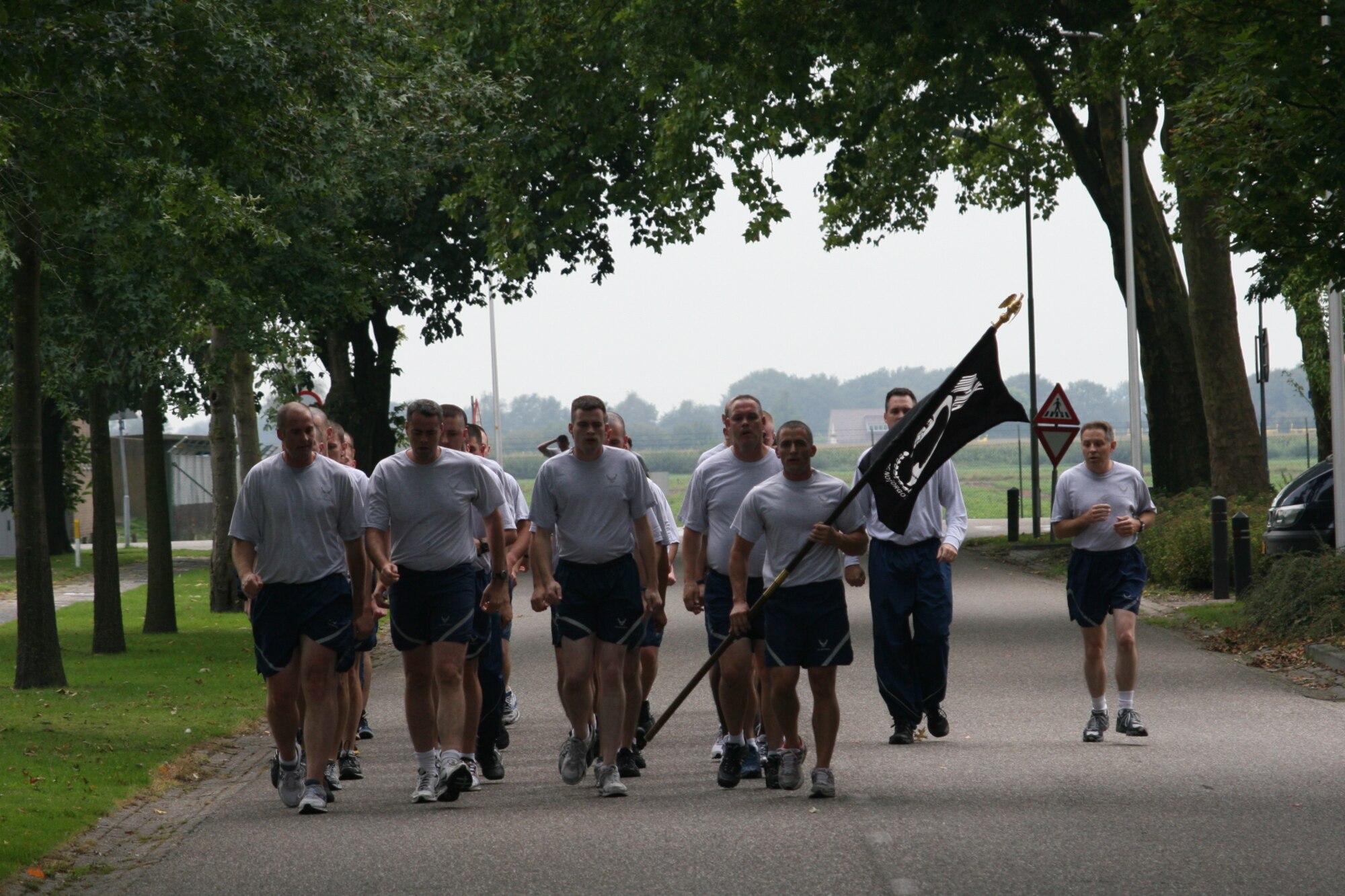 VOLKEL AIR BASE, Netherlands -- Airmen from the 703rd Munitions Support Squadron stand in formation during a memorial ceremony here Sept. 16. The ceremony was held on POW/MIA day to commemorate those who were captured as prisoners of war and those missing in action. (U.S. Air Force photo/Senior Airman Raymond Duesbury)