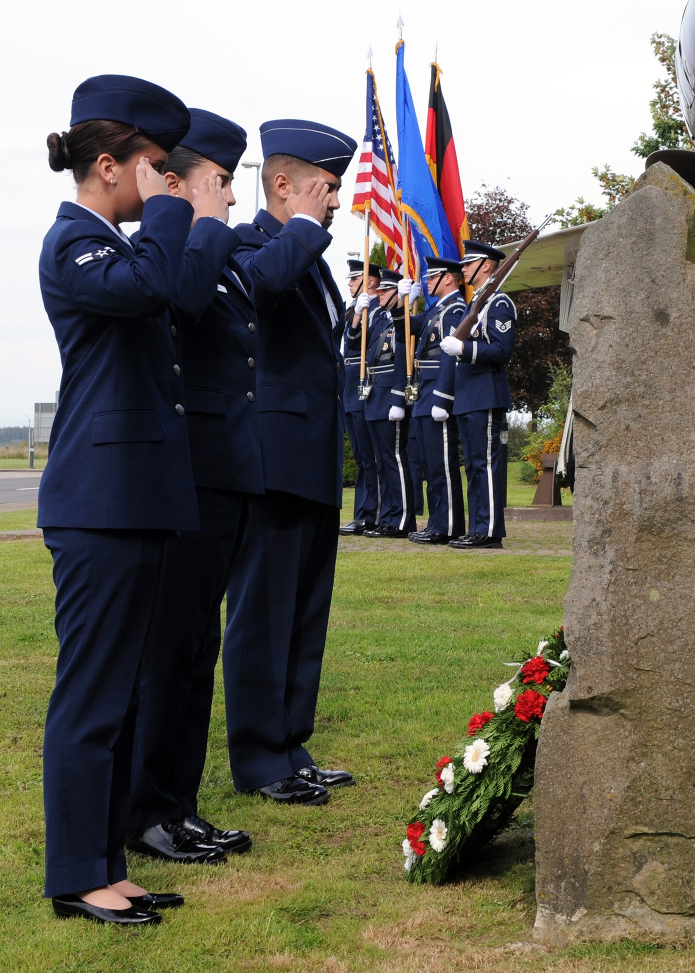 SPANGDAHLEM AIR BASE, Germany – Members of the 52nd Fighter Wing salute after laying a wreath at the POW/MIA memorial during the ceremony at the air park here Sept. 16. The ceremony is held every year to remember those who have served and been taken prisoner or have been listed as missing in action. (U.S. Air Force photo/Senior Airman Christopher Toon) 
