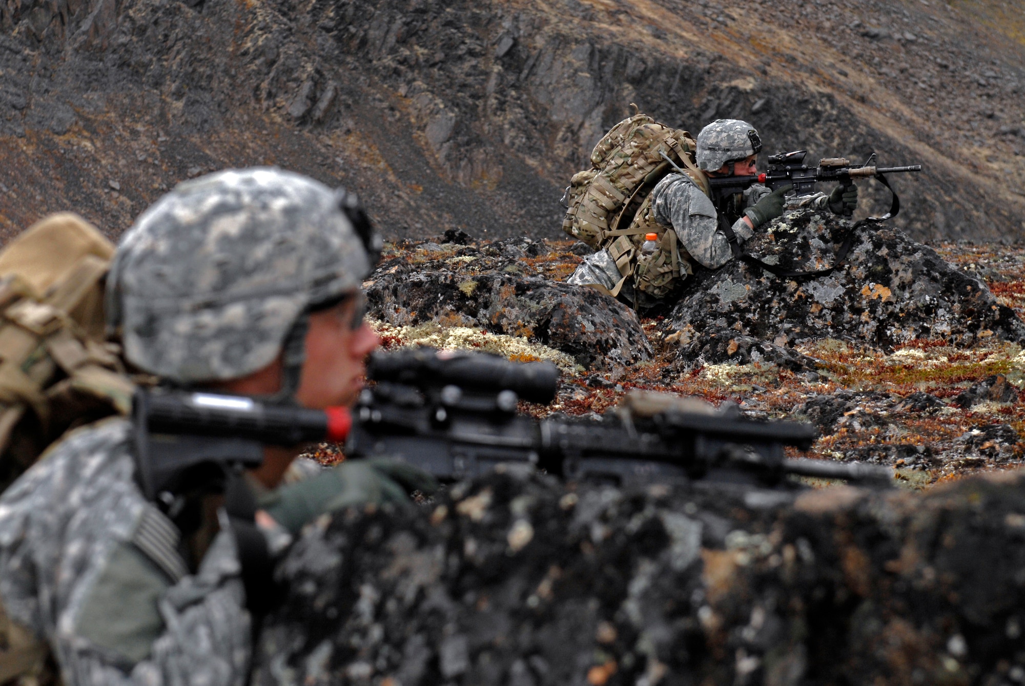 Soldiers from 1st Squadron (Airborne), 40th Cavalry Regiment provide security during a training mission near Joint Base Elmendorf-Richardson, Sept. 13. The mission consisted of an air assault, security operations and setting up observation posts. The Soldiers are training in preparation for a deployment to Afghanistan later this year.(U.S. Air Force photo/Staff Sgt. Brian Ferguson)(Released) 