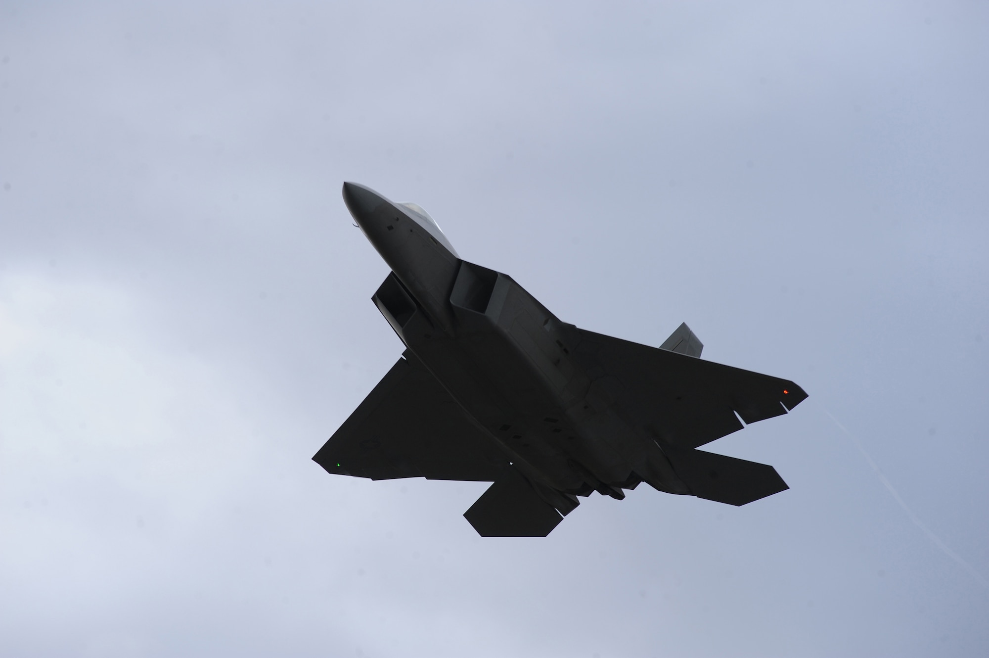 An F-22 Raptor takes off from Joint Base Elmendorf-Richardson, Alaska, Sept. 21, after a four month stand-down. Secretary of the Air Force Michael Donley and Chief of Staff Gen. Norton Schwartz recently approved an implementation plan developed by Air Combat Command officials that will allow the F-22 to resume flight operations. The commander of ACC directed a stand-down of the fleet May 3 as a safety precaution, following 12 separate reported incidents where pilots experienced hypoxia-like symptoms. (US Air Force photo/Senior Airman Cynthia Spalding)