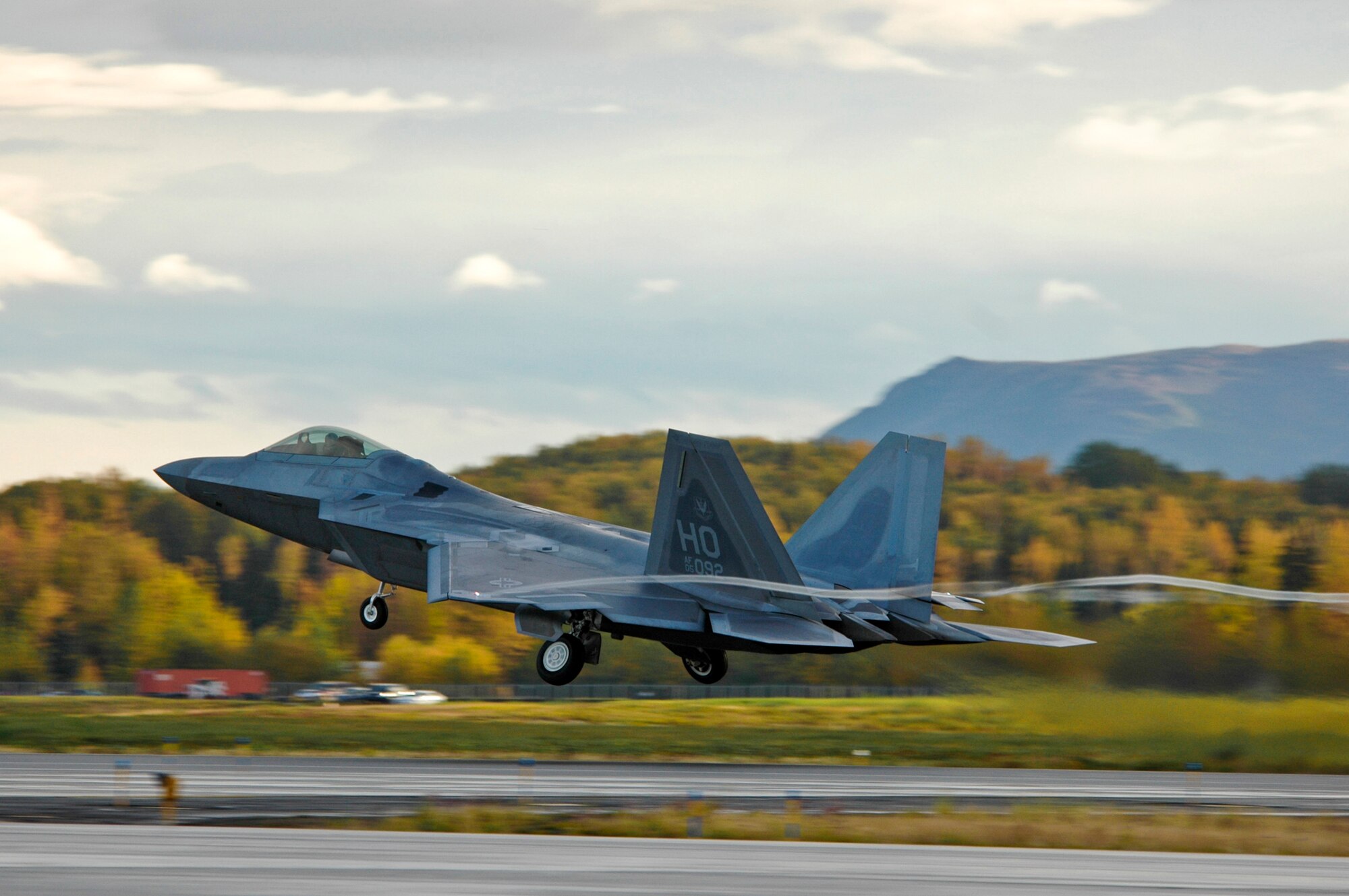An F-22 Raptor from the 525th Fighter Squadron takes off from Joint Base Elmendorf-Richardson, Alaska, Sept. 21, after a four-month stand down.  Secretary of the Air Force Michael Donley and Chief of Staff Gen. Norton Schwartz recently approved an implementation plan developed by Air Combat Command officials that will allow the F-22 to resume flight operations. The commander of Air Combat Command directed a stand-down of the fleet May 3 as a safety precaution, following 12 separate reported incidents where pilots experienced hypoxia-like symptoms. (U.S. Air Force photo/Senior Airman Christopher Gross)