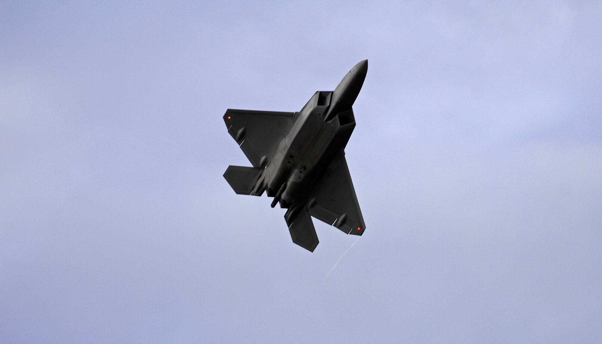 An F-22 Raptor takes off from Joint Base Elmendorf-Richardson, Alaska, Sept. 21, after a four-month stand down.  Secretary of the Air Force Michael Donley and Chief of Staff Gen. Norton Schwartz recently approved an implementation plan developed by Air Combat Command officials that will allow the F-22 to resume flight operations. The commander of Air Combat Command directed a stand-down of the fleet May 3 as a safety precaution, following 12 separate reported incidents where pilots experienced hypoxia-like symptoms. (U.S. Air Force photo/Staff Sgt. Brian Ferguson)