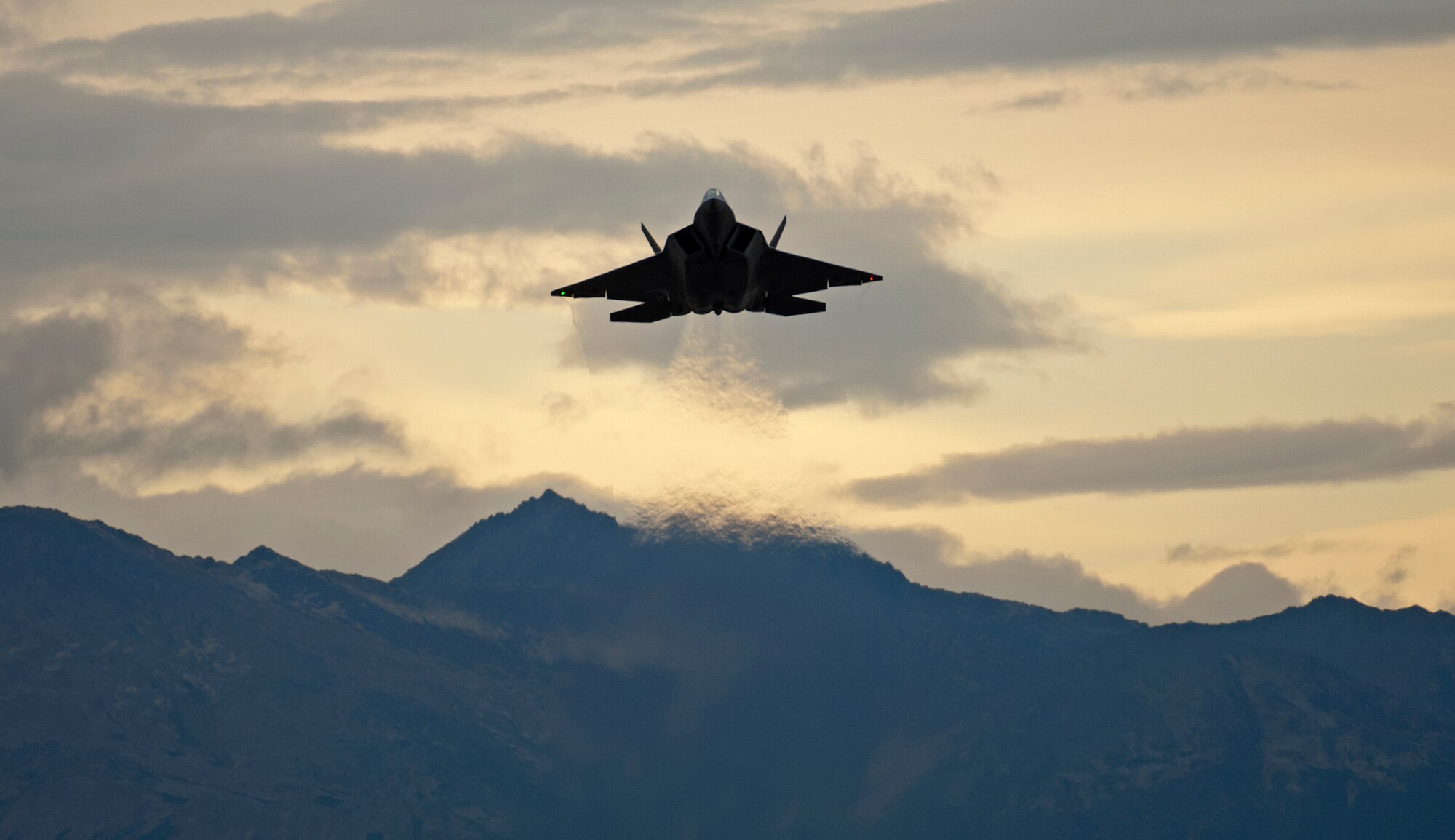 An F-22 Raptor takes off from Joint Base Elmendorf-Richardson, Alaska, Sept. 21, after a four-month stand down.  Secretary of the Air Force Michael Donley and Chief of Staff Gen. Norton Schwartz recently approved an implementation plan developed by Air Combat Command officials that will allow the F-22 to resume flight operations. The commander of Air Combat Command directed a stand-down of the fleet May 3 as a safety precaution, following 12 separate reported incidents where pilots experienced hypoxia-like symptoms. (U.S. Air Force photo/Staff Sgt. Brian Ferguson)
