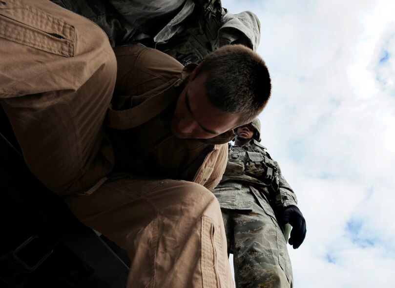 MINOT AIR FORCE BASE, N.D. – 91st Security Forces Group response team members apprehend exercise aggressors as part of the second annual Global Strike Challenge tryouts at the U-01 training center here Sept. 21. The GSC is a competition where Air Force Intercontinental Ballistic Missile and bomber forces compete against one another to be recognized as the best at what they do in the command. The challenge will be held at Barksdale AFB, La. (U.S. Air Force Photo / Airman 1st Class Stephanie Ashley)