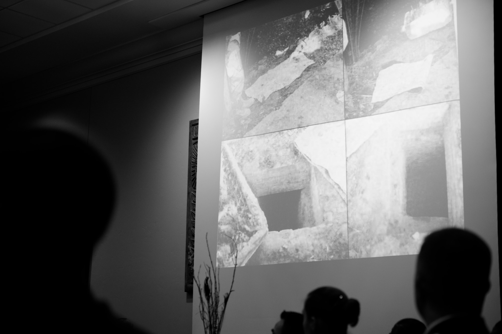 VANCE AIR FORCE BASE, Okla. – Photos of the hole which Saddam Hussein was hiding in are shown on a projector screen during Oklahoma State Senator Steve Russell’s speech at the Vance Air Force Base Birthday Ball. Russell was the commander of the 1st Brigade, 22nd Infantry Regiment, 4th Infantry Division, and helped lead the operations which led to the capture of Hussein. (U.S. Air Force photo/ Staff Sgt. James Bolinger)