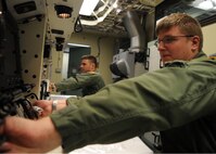 MINOT AIR FORCE BASE, N.D. -- Capt. Skylar Wood, 740th Missile Squadron missile combat crew commander, inserts the launch key or keys here, Sept. 15. As part of this simulation in a missile launch trainer, the turn-to-launch key is used to activate and launch the ICBM. The 91st Missile Wing commands 150 Minuteman III ICBMs covering more than 8,500 square miles of the missile complex in North Dakota. Combat crew commanders and deputy crew commanders have spent extra hours training for the Air Force Global Strike Command Global Strike Challenge. (U.S. Air Force photo / Senior Airman Ashley N. Avecilla)