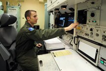 MINOT AIR FORCE BASE, N.D. – Capt. Zach Eagle, 741st Missile Squadron missile combat crew commander, participates in a training exercise at the missile procedures trainer here Sept. 21. Eagle, a missileer, plays an important part in the 91st Missile Wing’s mission of providing safe, secure and effective combat power in the missile complex; an area that stretches over 8,500 square miles in the North Dakota plains. (Courtesy photo)