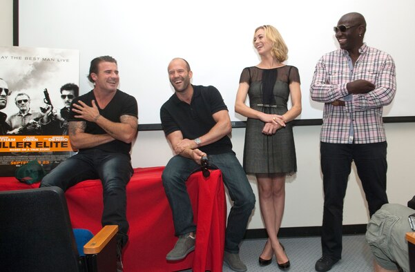 From left: Dominic Purcell, Jason Statham, Yvonne Strahovski and Adewale Akinnuoye-Agbaje, meet with Edwards Airmen who have been deployed and spouses of the deployed Airmen in the Public Affairs and Multimedia building theater. The actors spent about an hour and a half answering questions and meeting with the families of those deployed and recently deployed services members before heading off to the base theater. (Air Force photo by Rob Densmore)