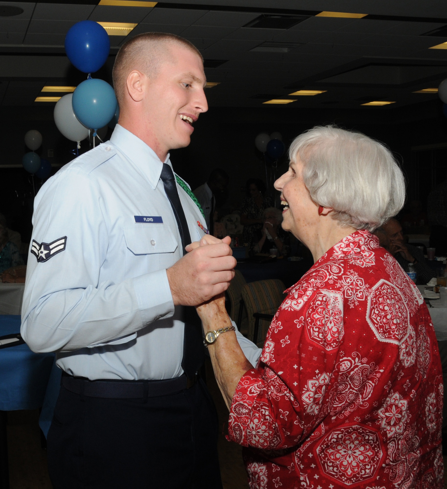 Airman 1st Class Chaz Floyd dances with resident Helen Bieda at the Armed Forces Retirement Home’s Air Force birthday party Sept. 16. Floyd is a student in the 366th Training Squadron Detachment 6 at the Naval Construction Battalion Center in Gulfport.  Lt. Col. Jeffrey McLemore, 334th TRS commander, was the guest speaker for the occasion.  (U.S. Air Force photo by Kemberly Groue)