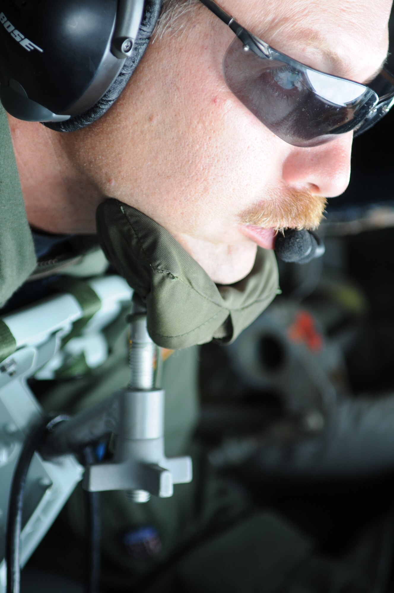 GRISSOM AIR RESERVE BASE, Ind. -- Master Sgt. Paul Sherrod, 72nd Air Refueling Squadron in-flight refueling technician, watches diligently as he guides the boom of a KC-135R Stratotanker into the receiving end of a B-52 Stratofortress Sept. 14. The refueling mission gave crew from both aircraft training and experience in aerial refueling, which keeps them ready for any mission around the world. (U.S. Air Force photo/Senior Airman Jami K. Lancette) 