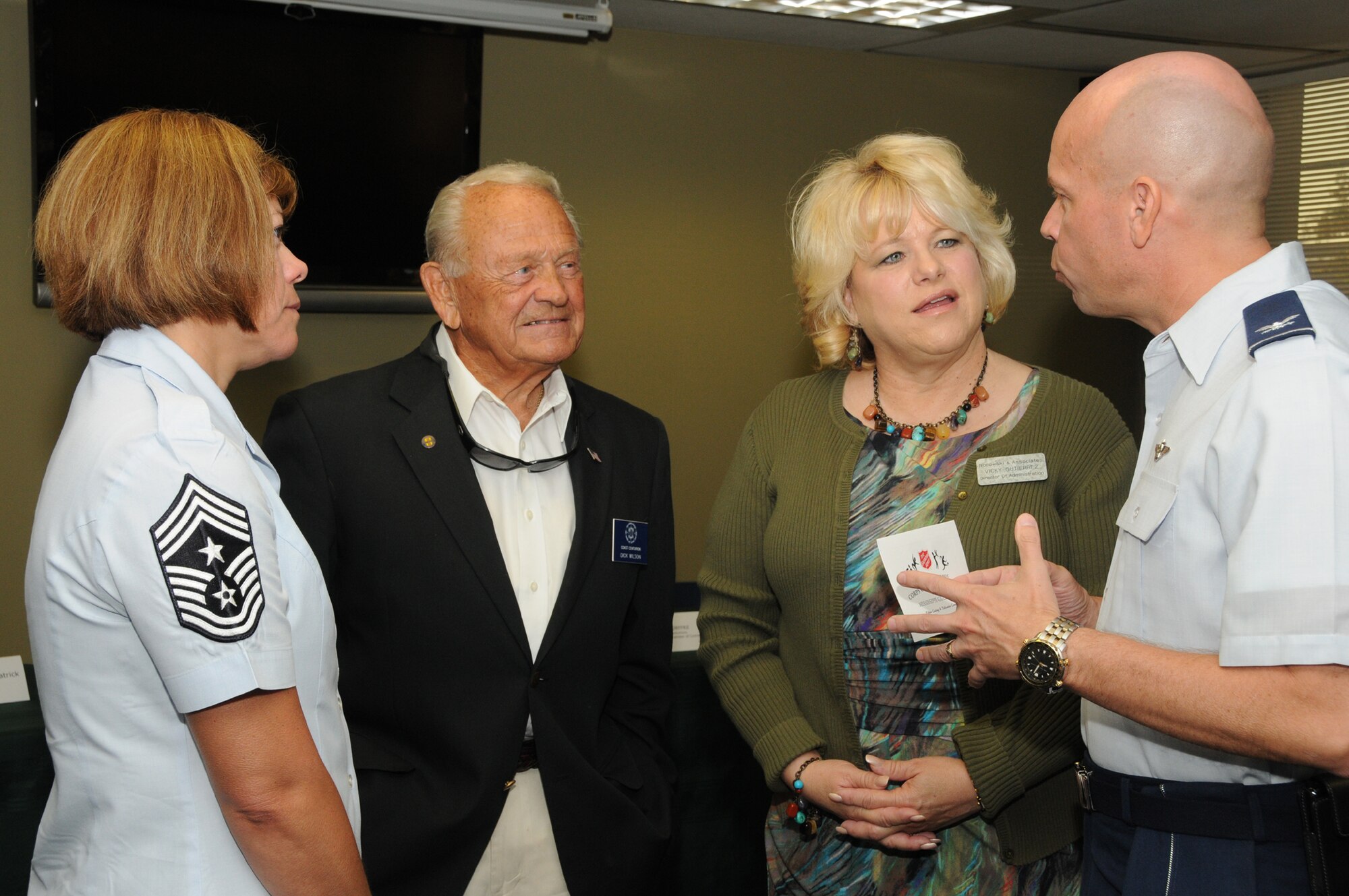 From left, Chief Master Sgt. Angie Johnson, 81st Training Wing command chief; Dick Wilson, Biloxi Chamber of Commerce and Mississippi Coast Military Officers Association member; Vicky Gutierrez, director of administration for Norowski and Associates; and Col. Glen Downing, 81st TRW vice commander, visit during the Biloxi Chamber of Commerce “Breakfast with the Mayor” Sept. 14.  The event is held at various Biloxi locations and gives Mayor A.J. Holloway an opportunity to give updates on city issues and projects to community leaders.  A special welcome was given to Maj. Gen. Len Patrick, who assumed command of 2nd Air Force July 21.  (U.S. Air Force photo by Kemberly Groue)
