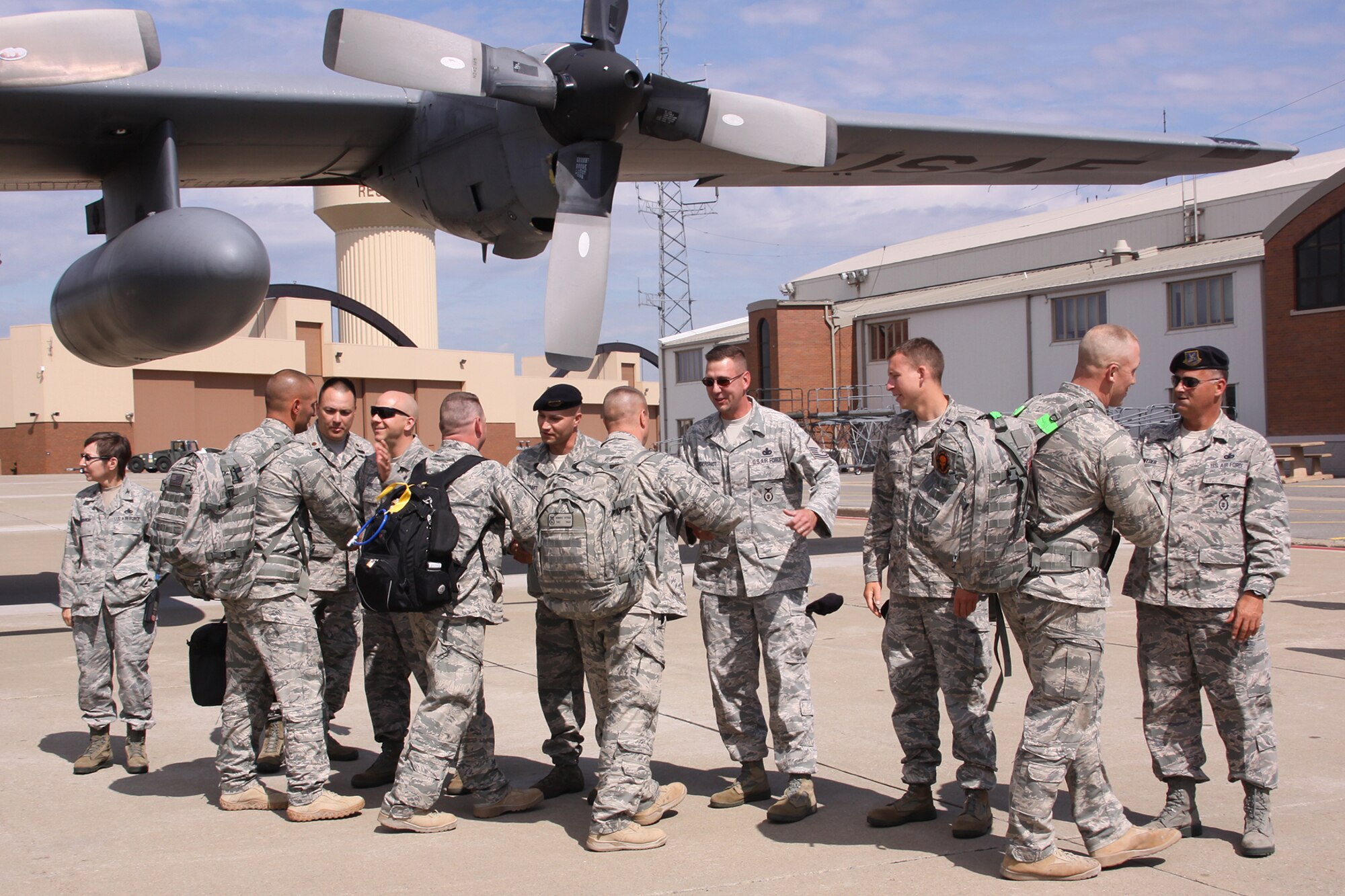 PITTSBURGH IAP ARS -- Members of the 911th Security Forces Squadron are greeted as they return home from Afghanistan, Sept. 21. The 13 Airmen answered a call for volunteers to replace a Security Forces team from Royal Air Force Lakenheath, England, which came under attack at the Frankfurt International Airport in Germany this past March. (U.S Air Force/Senior Airman Jonathan Hehnly)
