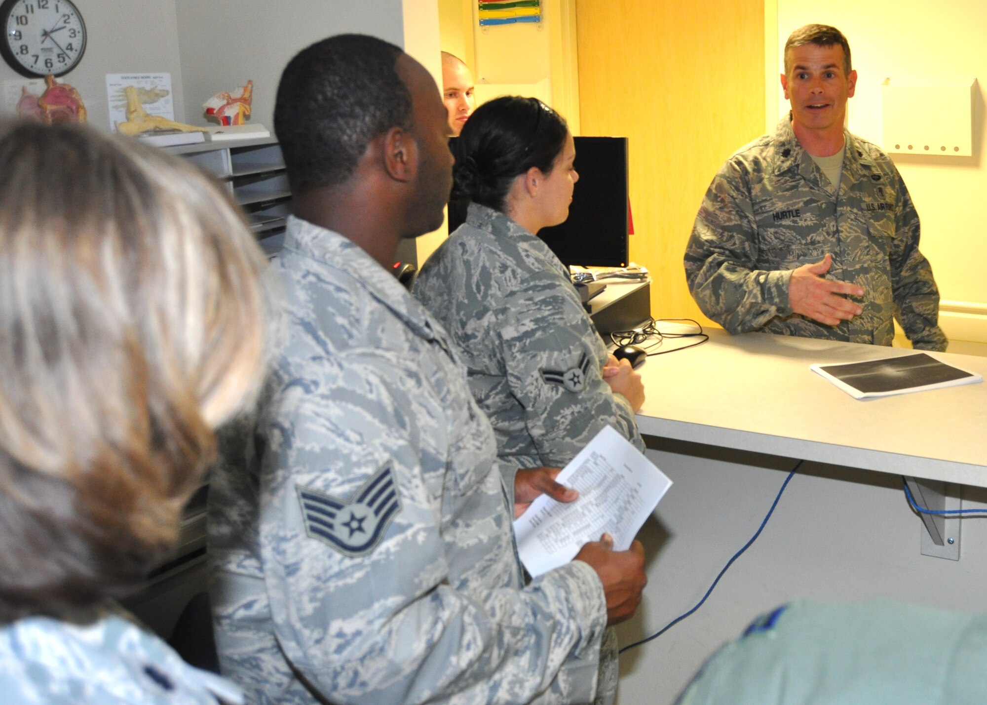 Lt. Col. William Hurtle, right, new 81st Aerospace Medicine Squadron commander, talks with Staff Sgt. LaKedrian Guy, left, and Airman 1st Class Ashley Figueroa during a recent visit to the squadron’s flight medicine flight. The unit’s other six flights are bioenvironmental engineering, optometry, public health, audiology, health promotions and trainee health.  Hurtle came to Keesler from Royal Air Force
Lakenheath, United Kingdom, where he commanded the 48th AMDS  bioenvironmental engineering flight. He assumed command Aug. 30 from Lt. Col. Brian Casleton, who now commands the 455th Expeditionary Medical Operations
Squadron at BagramAir Base, Afghanistan.  (U.S. Air Force photo by Steve Pivnick)